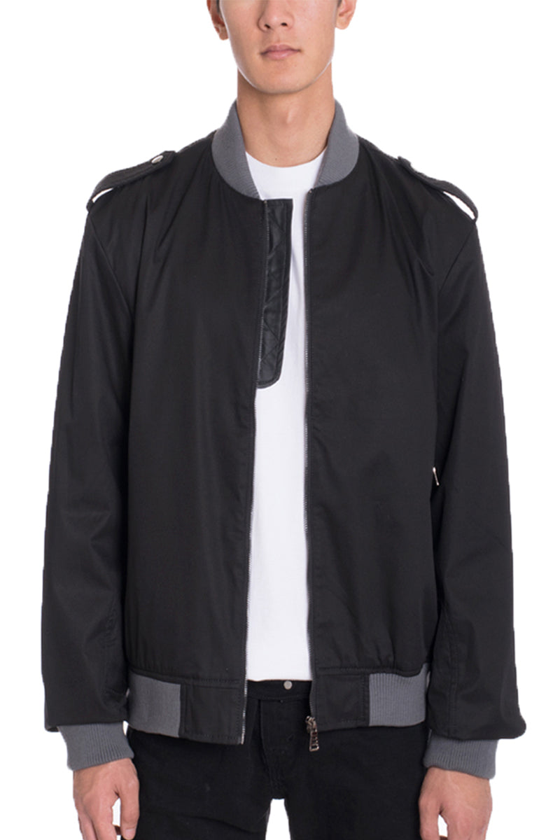 A stylish cotton windbreaker in a regular fit, featuring button trims on the shoulders and a water-resistant finish, perfect for casual wear.