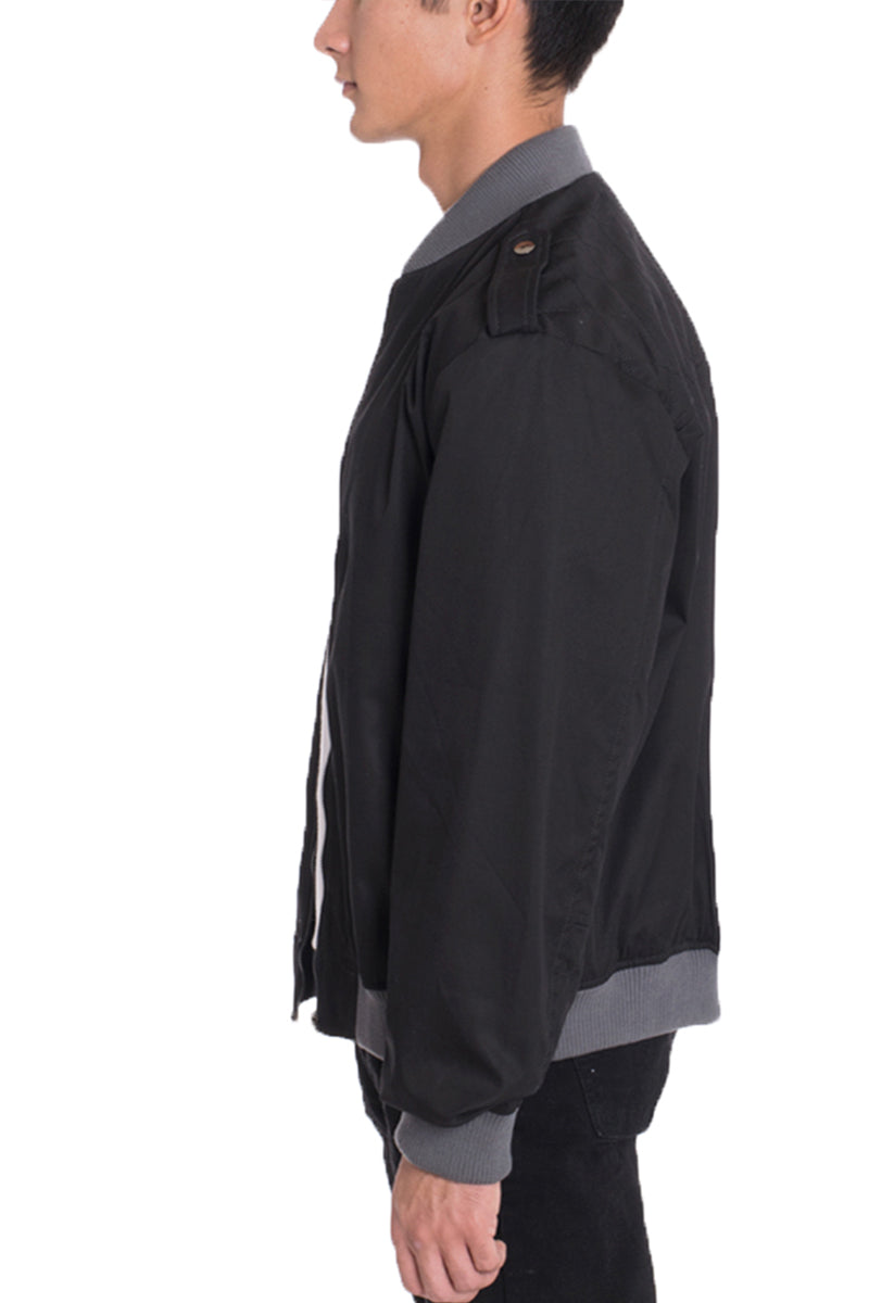 A stylish cotton windbreaker in a regular fit, featuring button trims on the shoulders and a water-resistant finish, perfect for casual wear.