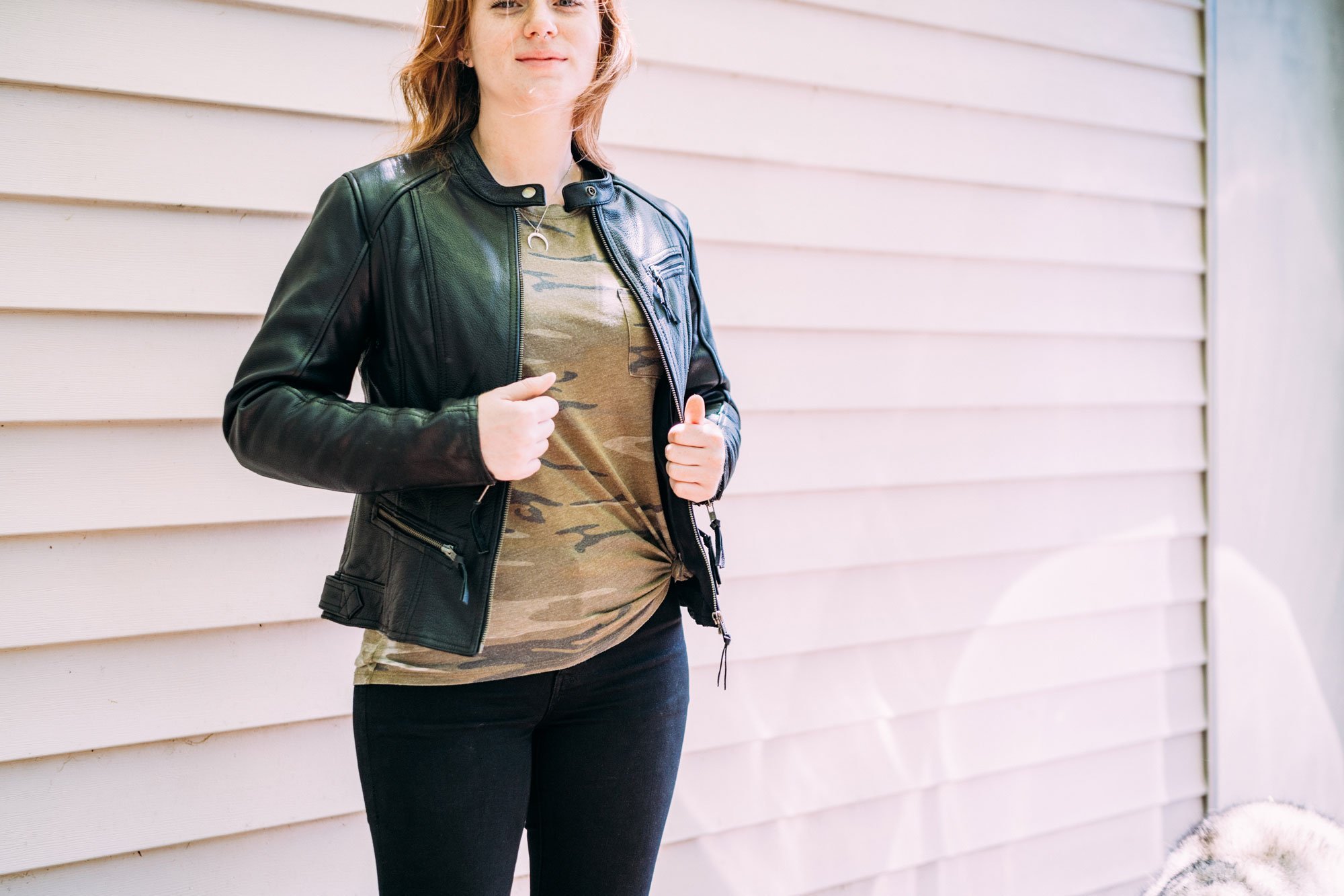 Fashionista Women's Motorcycle Leather Jacket made from premium cowhide, featuring a stylish scooter design with zippered pockets and insulated liner.