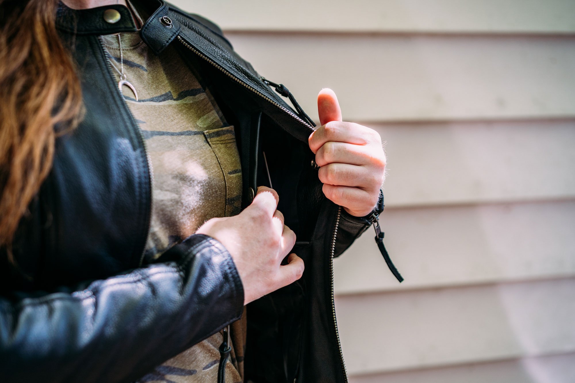 Fashionista Women's Motorcycle Leather Jacket made from premium cowhide, featuring a stylish scooter design with zippered pockets and insulated liner.