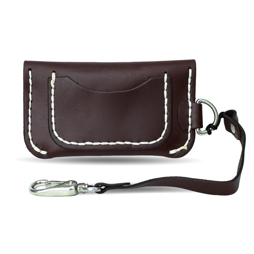 Half Trucker wallet showcasing its compact design, large snap pocket, and leather strap.