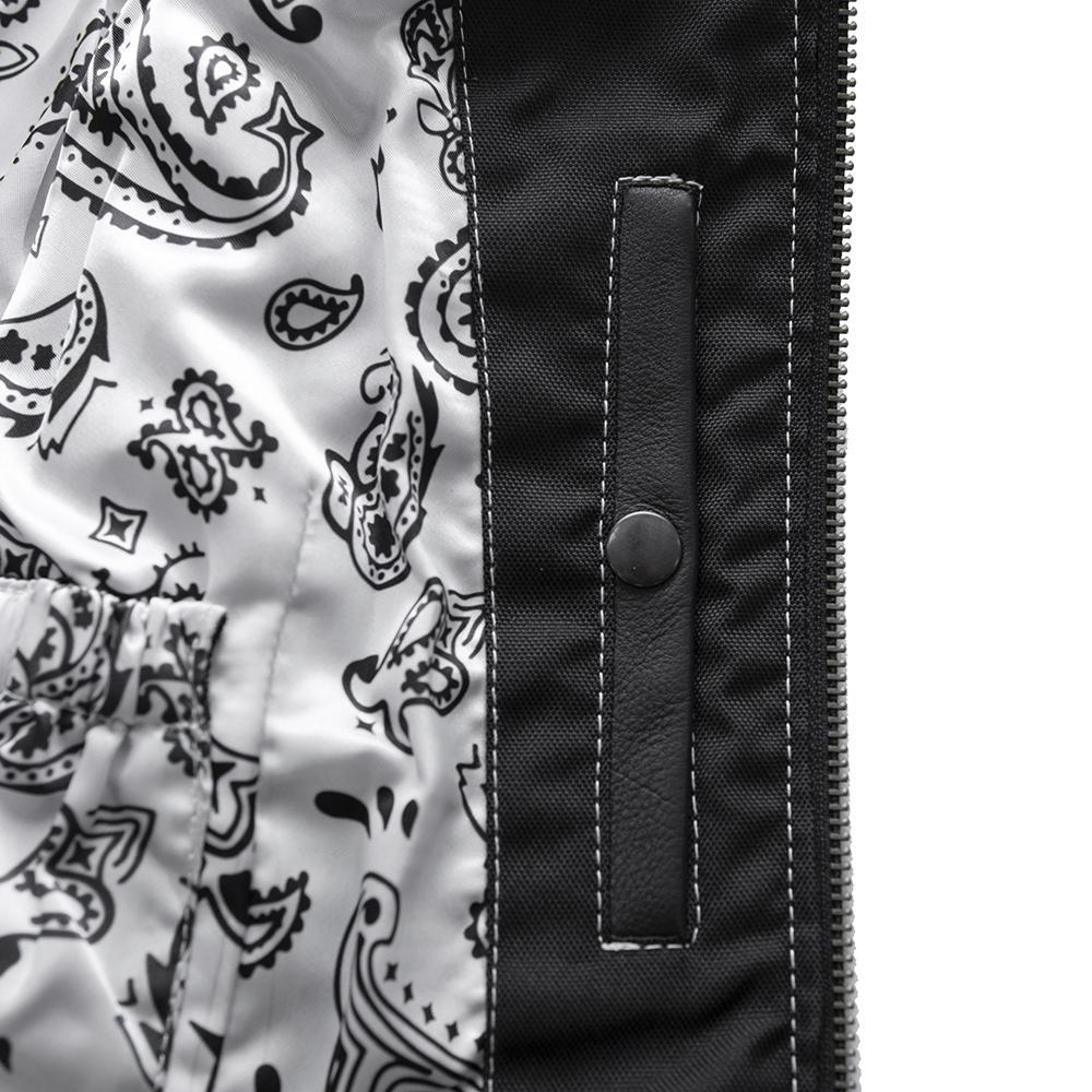 Quinn Women's Club Style Leather Vest in black leather with paisley lining, featuring a center zipper and multiple zippered pockets.