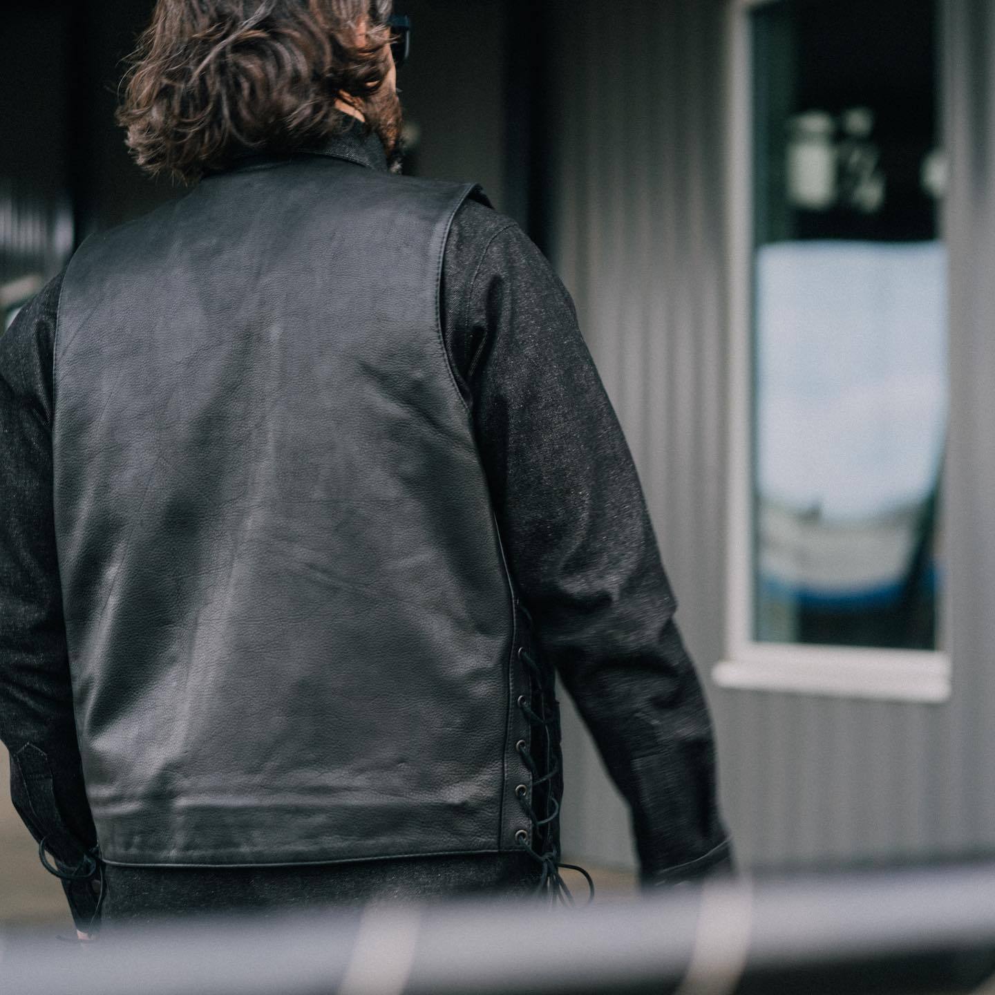 Rancher Men's Western Vest made from durable cowhide leather, featuring a v-neck, snap front, and concealed carry pockets.