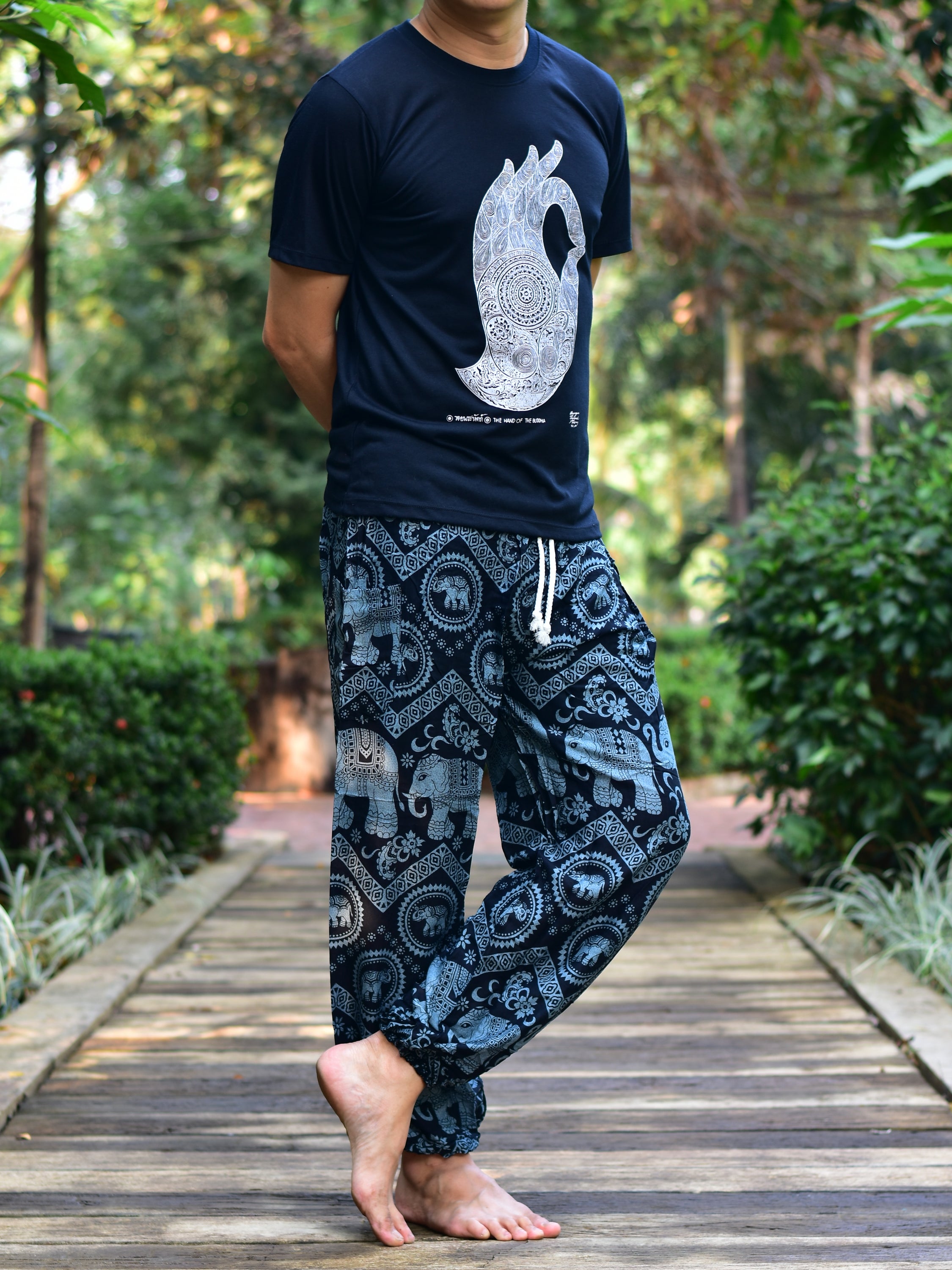 Bohotusk Men's Black Elephant Tusker Harem Pants showcasing a unique elephant print, elasticated waist, and external pocket.