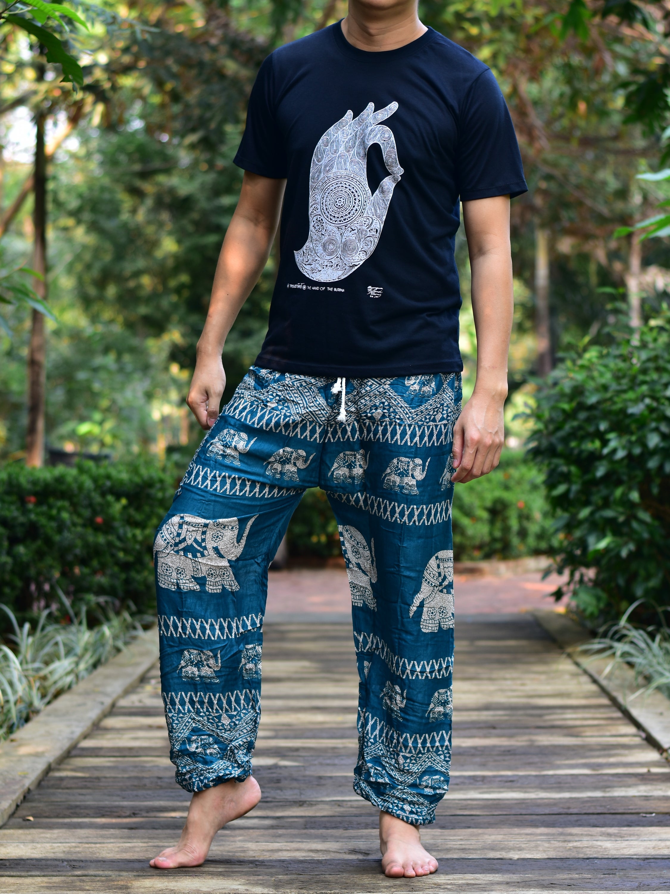 Bohotusk Men's Green Elephant Bull Print Harem Pants featuring a vibrant elephant design and comfortable cord tie waist.