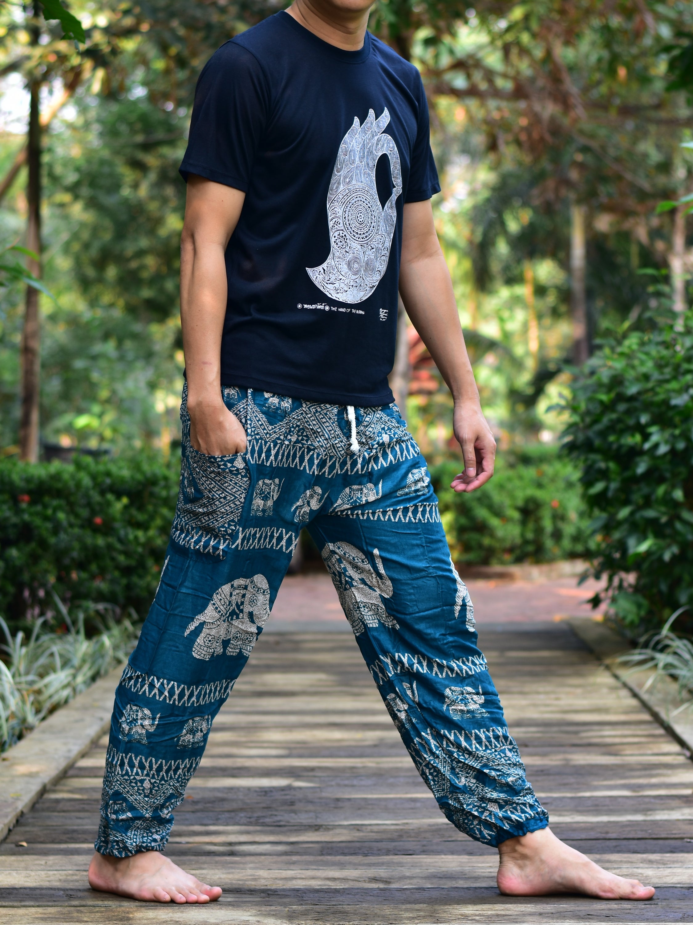 Bohotusk Men's Green Elephant Bull Print Harem Pants featuring a vibrant elephant design and comfortable cord tie waist.