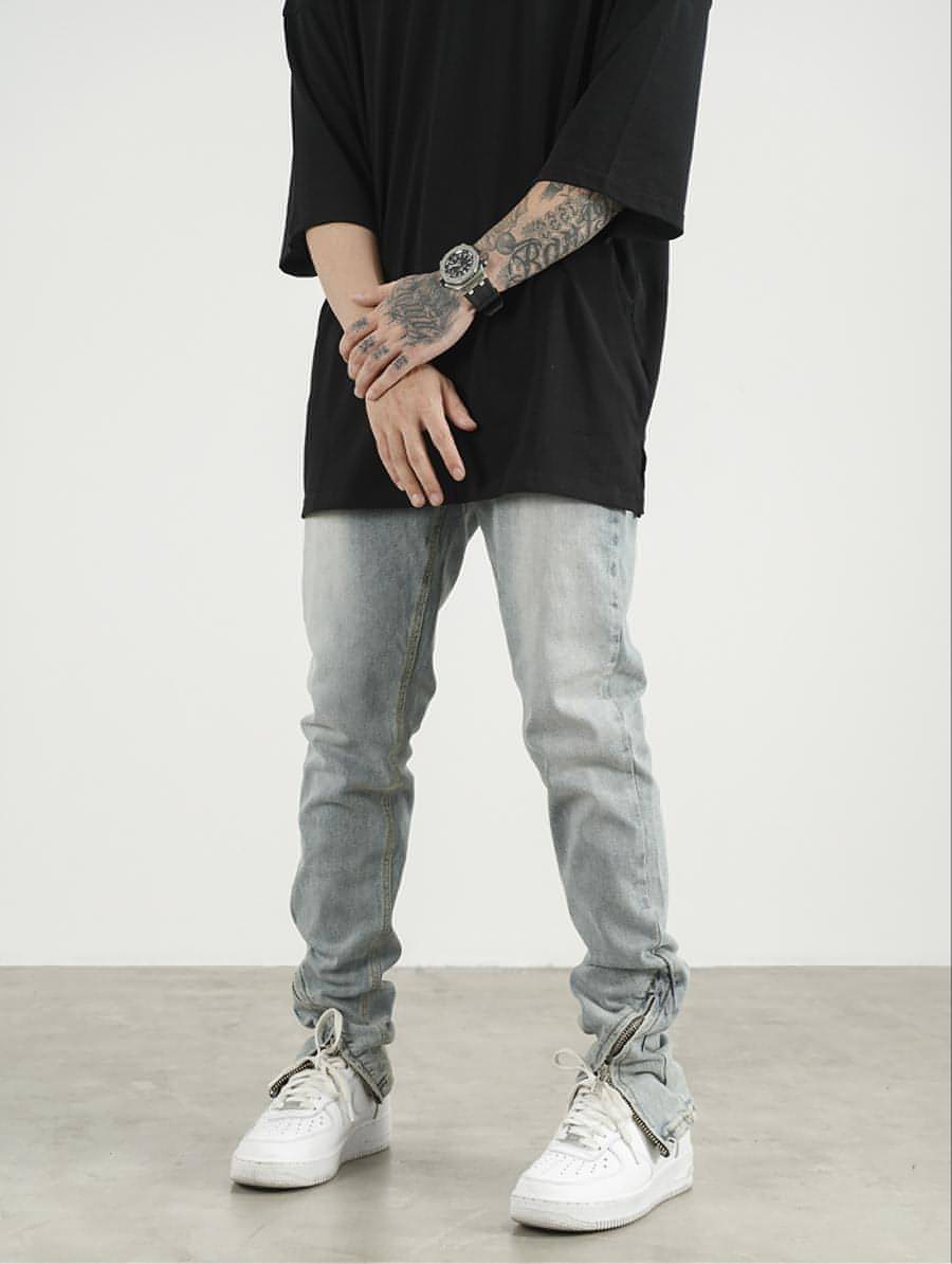 Men's High Street Zipper Split Slim Jeans featuring trendy zipper and split details for a modern look.