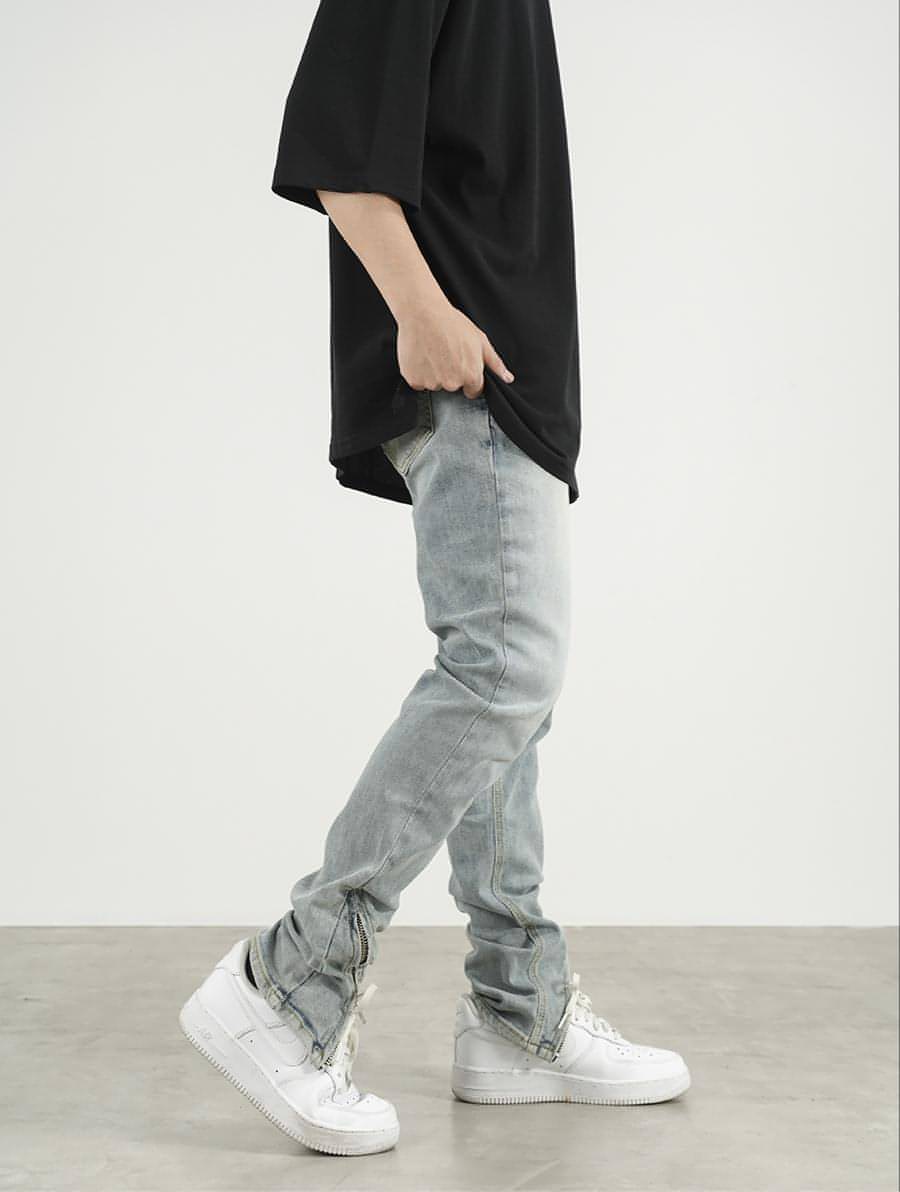 Men's High Street Zipper Split Slim Jeans featuring trendy zipper and split details for a modern look.