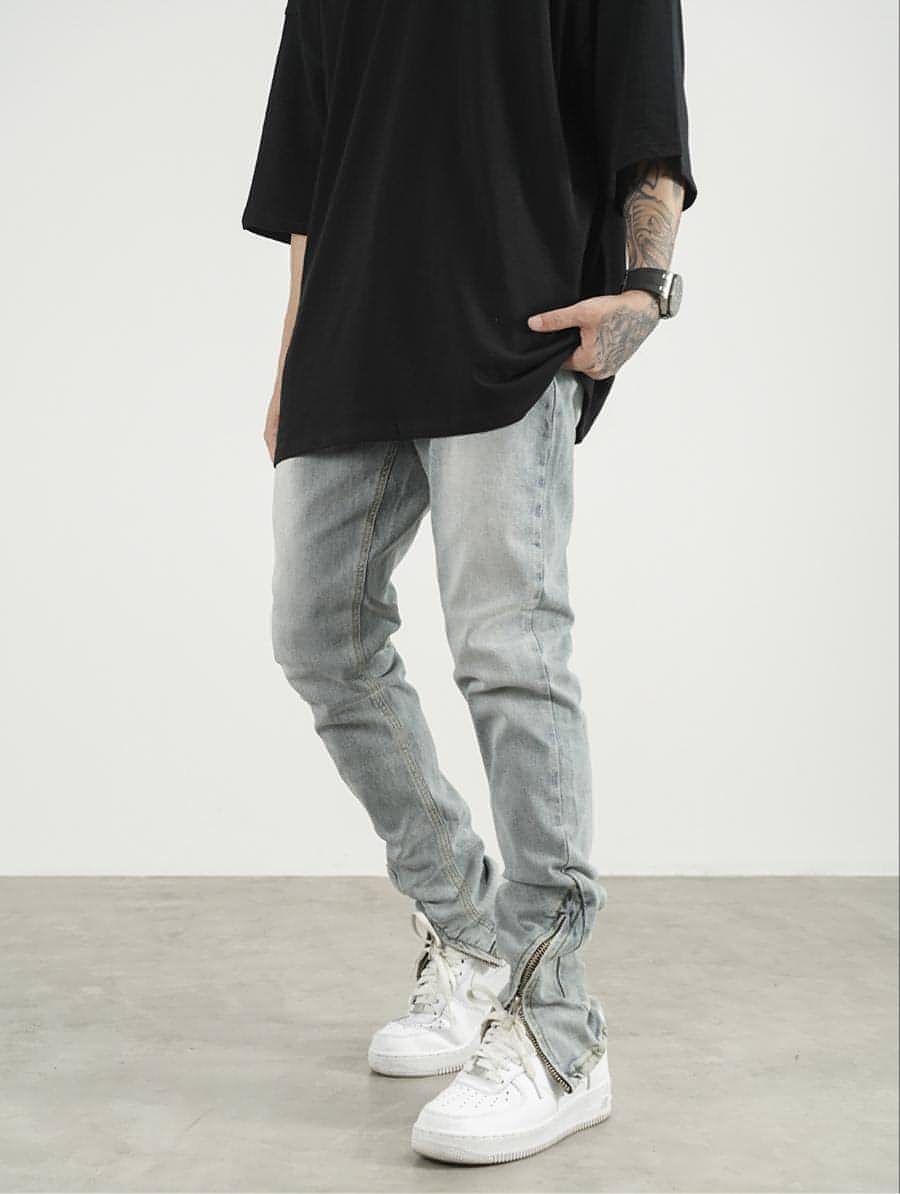 Men's High Street Zipper Split Slim Jeans featuring trendy zipper and split details for a modern look.