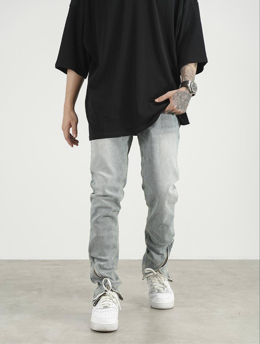 Men's High Street Zipper Split Slim Jeans featuring trendy zipper and split details for a modern look.