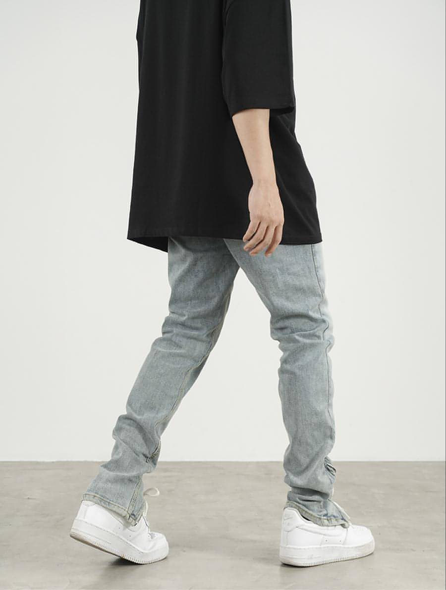 Men's High Street Zipper Split Slim Jeans featuring trendy zipper and split details for a modern look.