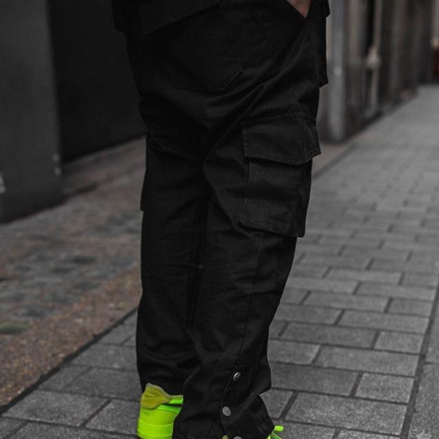 Multi-Pocket Casual Cargos in green, black, and khaki colors, showcasing multiple pockets and a loose fit design for men.