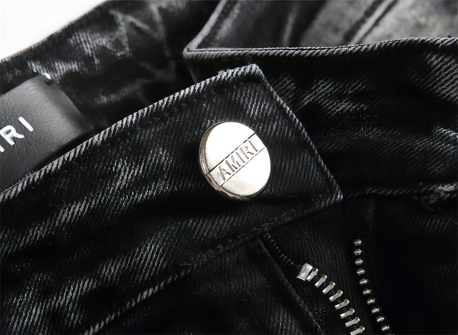 Punk men's jeans featuring unique hole embroidery and five-pointed star detailing, showcasing a rebellious style.