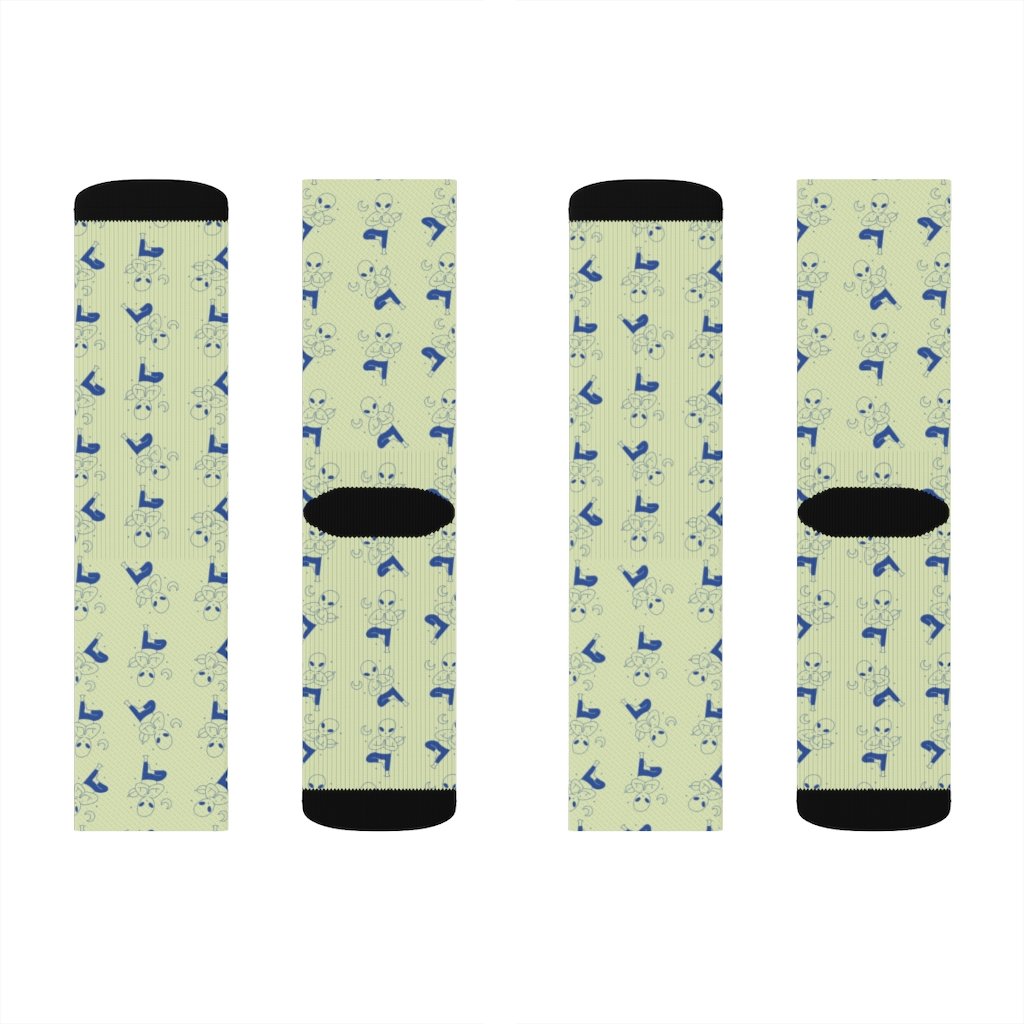 A pair of stylish Alien Yoga Socks featuring a unique alien print, designed for comfort and style.