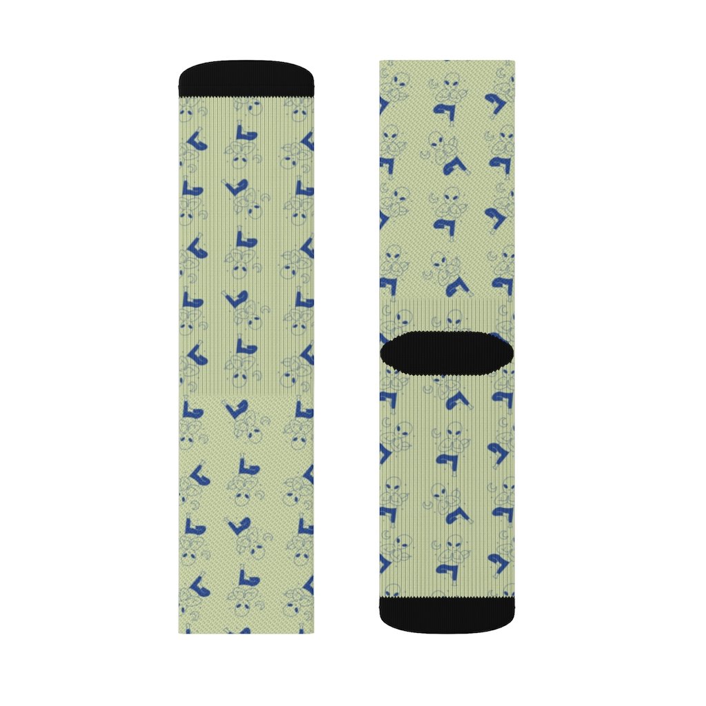 A pair of stylish Alien Yoga Socks featuring a unique alien print, designed for comfort and style.