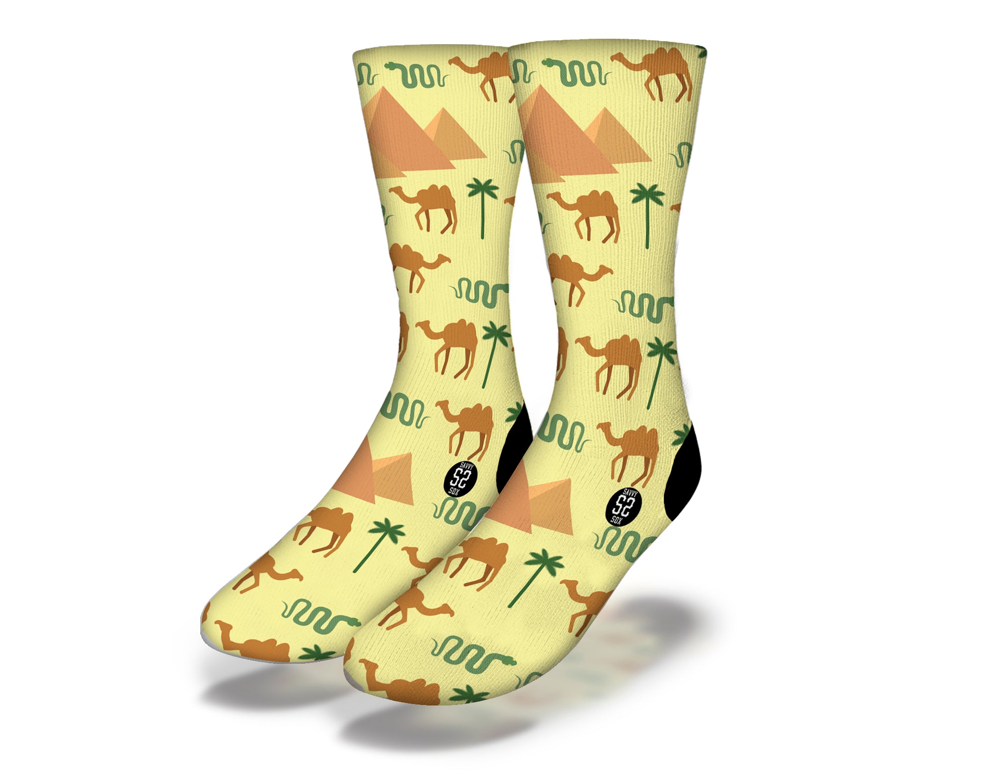 Colorful EGYPTIAN CAMELS & PYRAMIDS Fun World Socks featuring silhouettes of camels, snakes, and pyramids against a golden background.