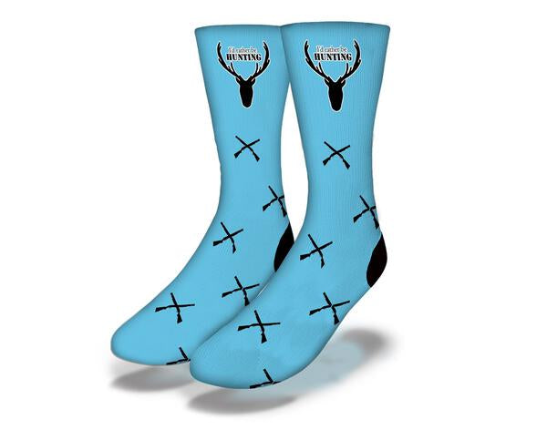 A vibrant blue t-shirt with the text 'I'd Rather Be Hunting' printed prominently, showcasing a passion for hunting.