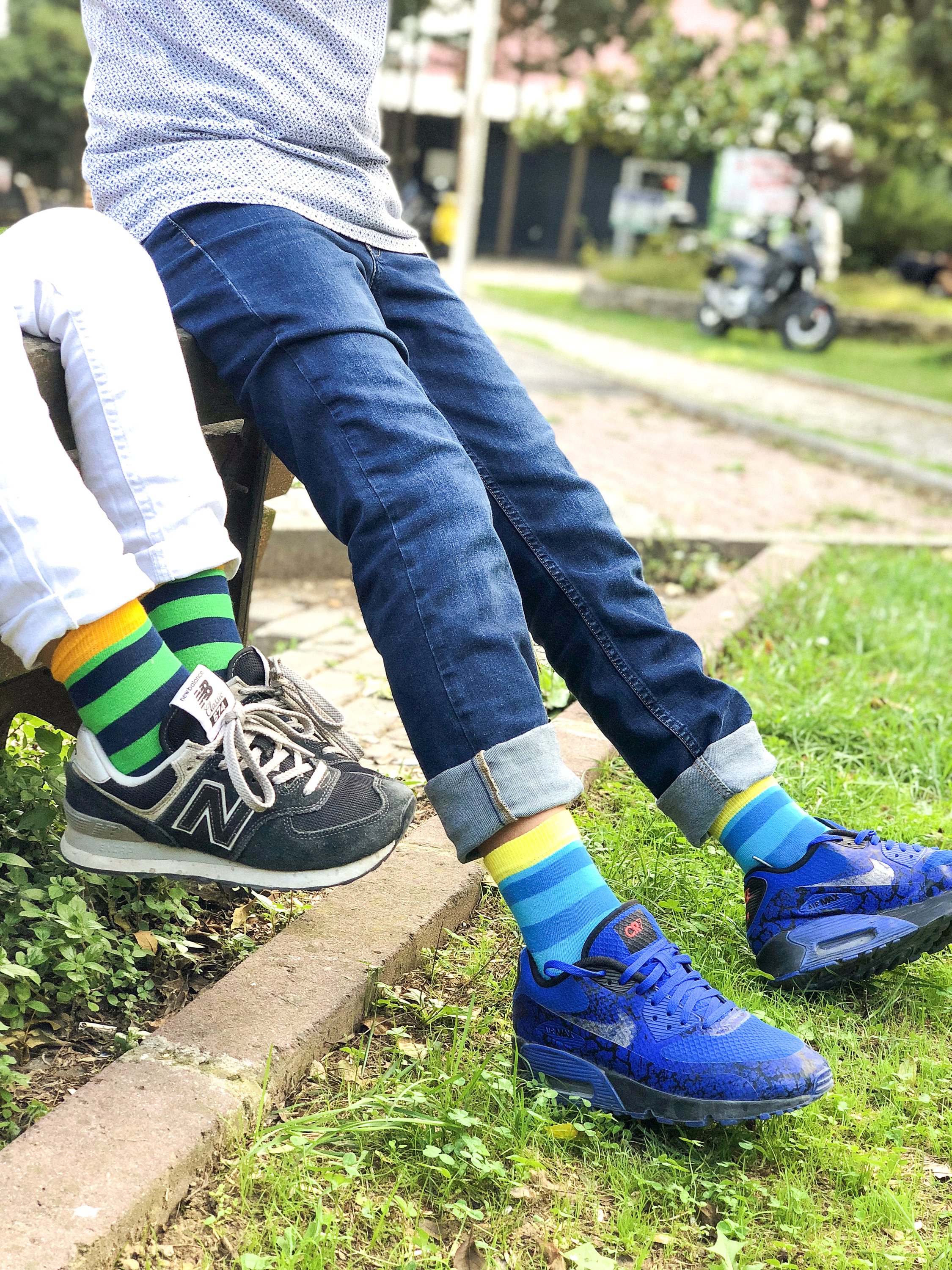Kids Yellow Sky Stripe Socks featuring vibrant yellow and blue stripes, made from soft cotton for comfort.