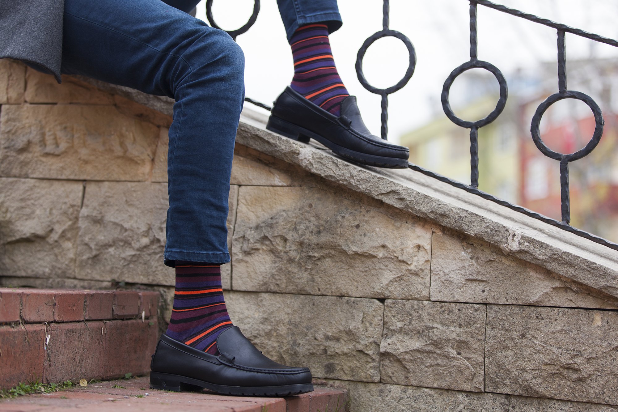Men's Garnet Stripe Socks featuring vibrant colors and trendy patterns, perfect for adding style to any outfit.