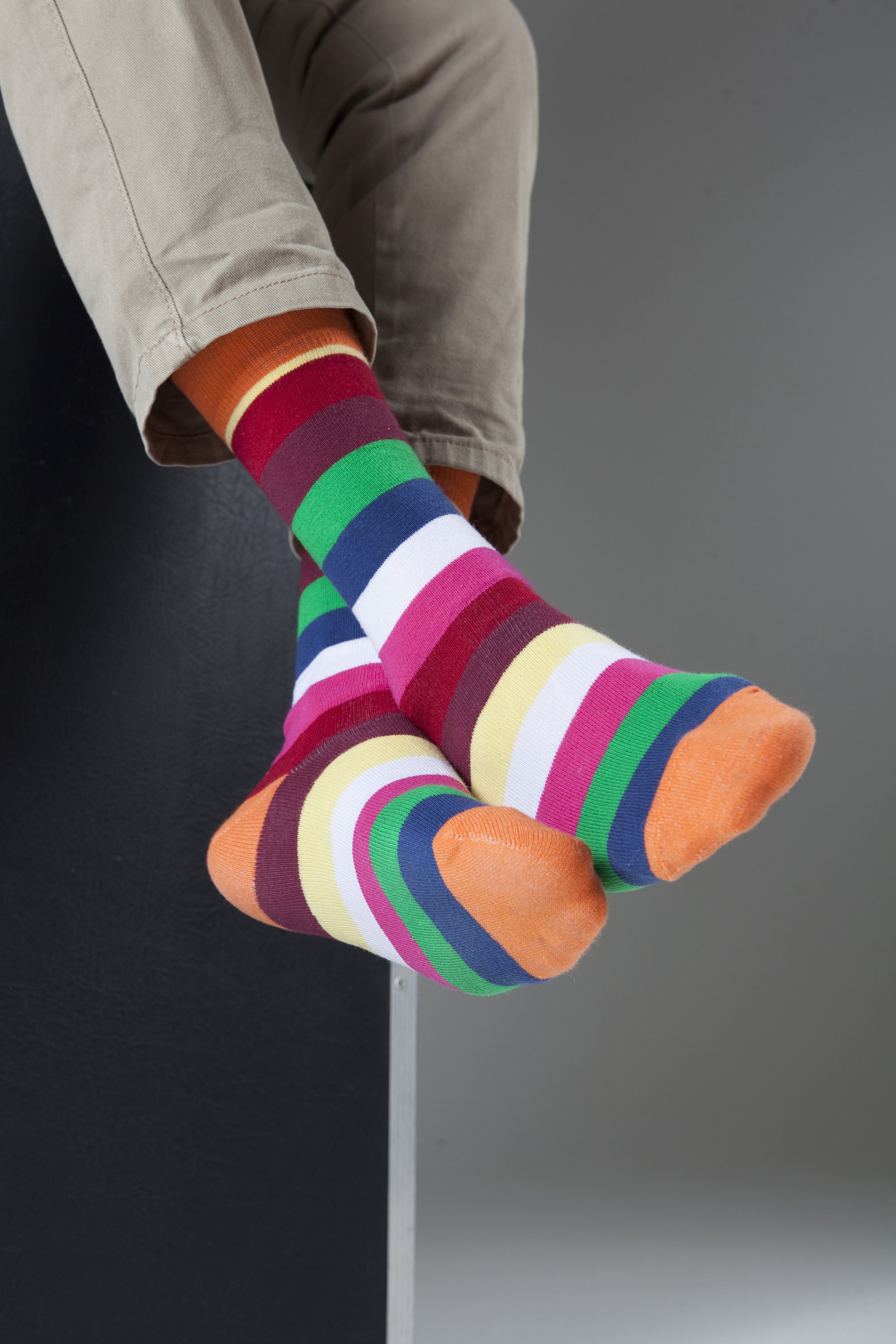 Men's Pumpkin Stripe Socks featuring vibrant colors and a trendy design, perfect for adding style to any outfit.