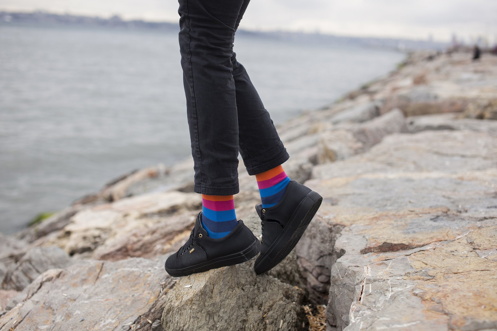 Men's Rainbow Stripe Socks featuring vibrant colors and a stylish design, made from soft Turkish cotton for comfort.