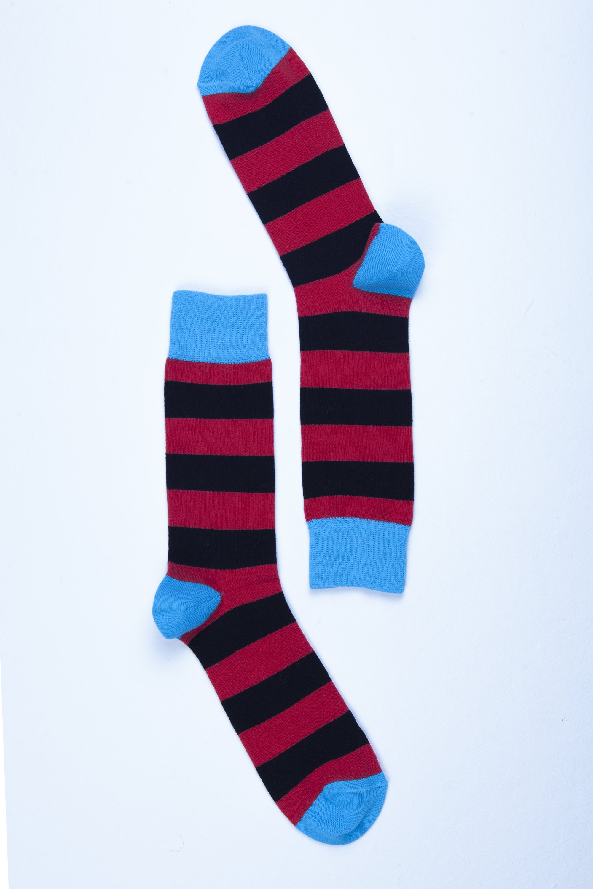 Men's Red Sky Stripe Socks featuring vibrant colors and a trendy design, perfect for adding flair to any outfit.