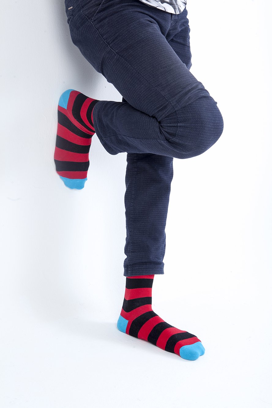 Men's Red Sky Stripe Socks featuring vibrant colors and a trendy design, perfect for adding flair to any outfit.