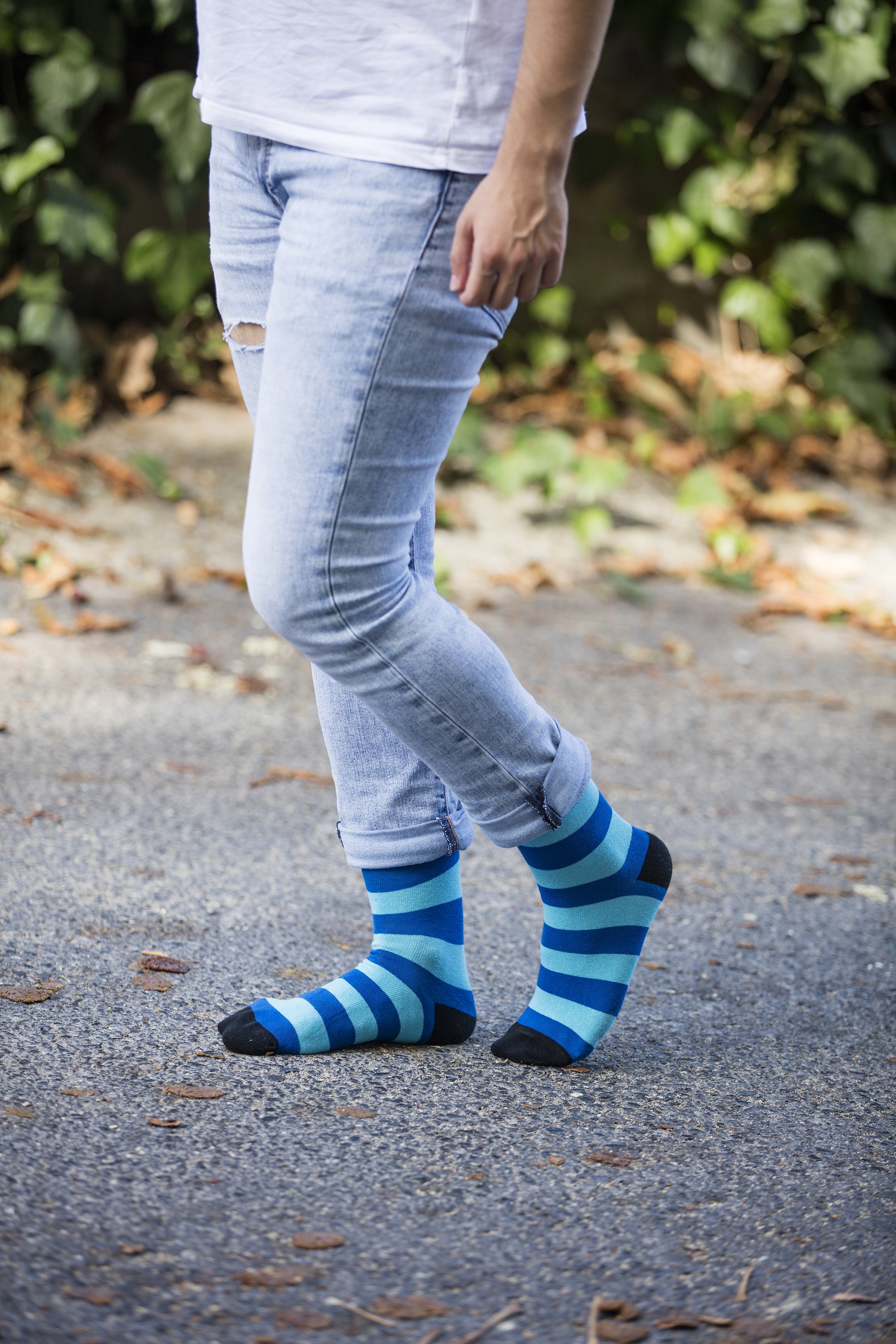 Men's sky blue stripe socks showcasing a vibrant design, perfect for adding a stylish touch to any outfit.
