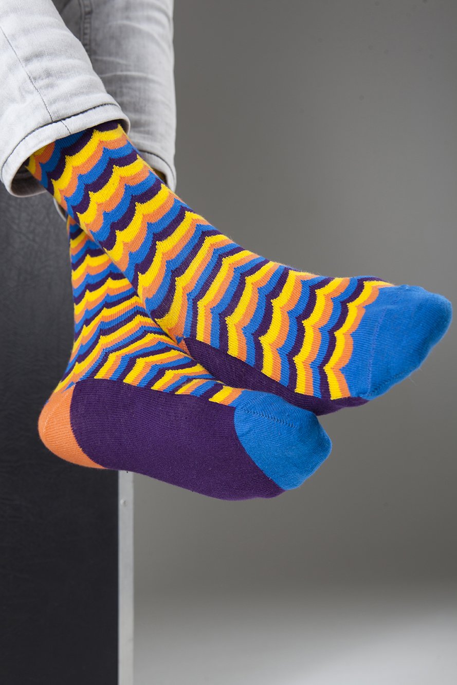 Men's Tangerine Wave Socks featuring a vibrant wave pattern in tangerine color, made from soft Turkish cotton.