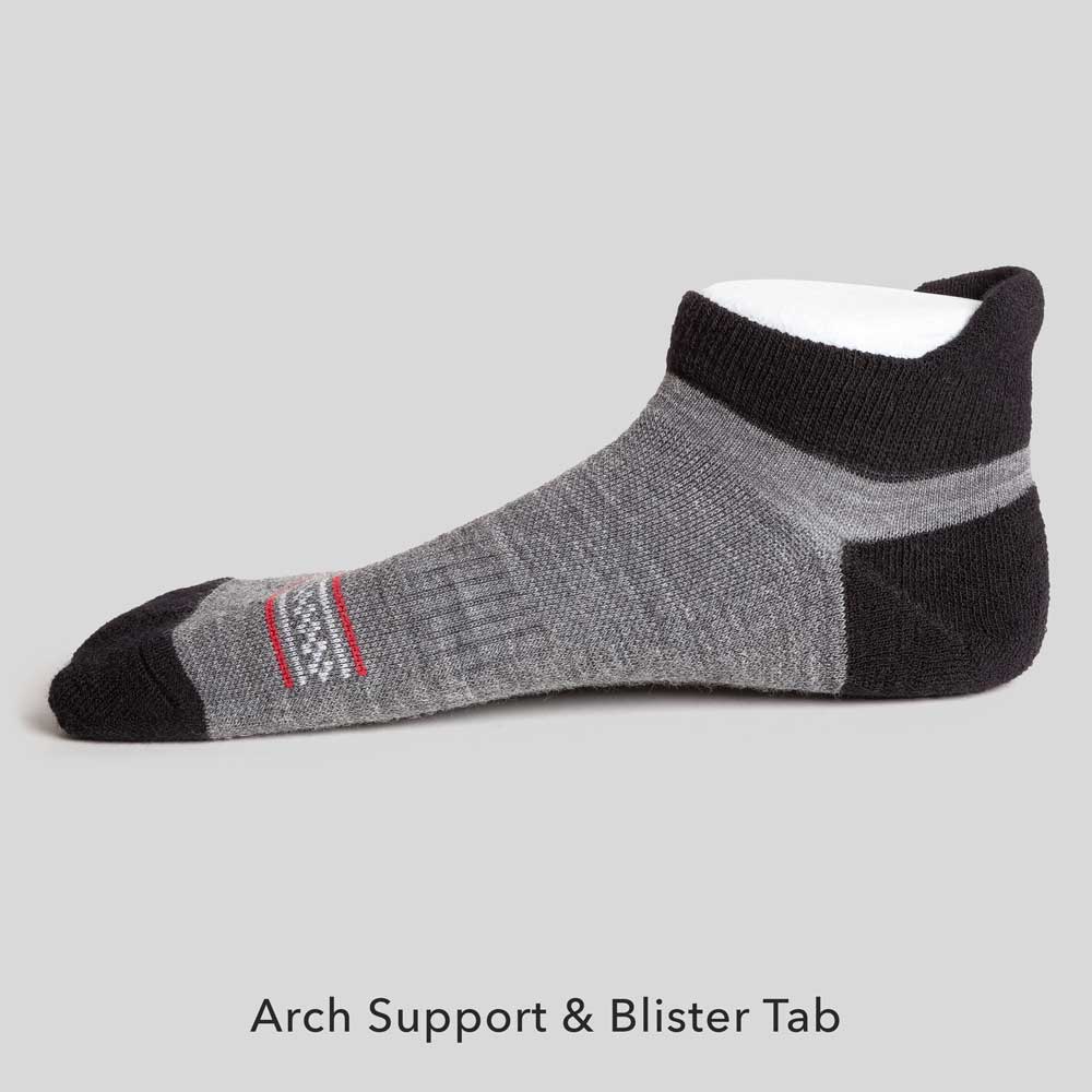 Dark gray Merino wool no show socks with blister tab, designed for comfort and protection.
