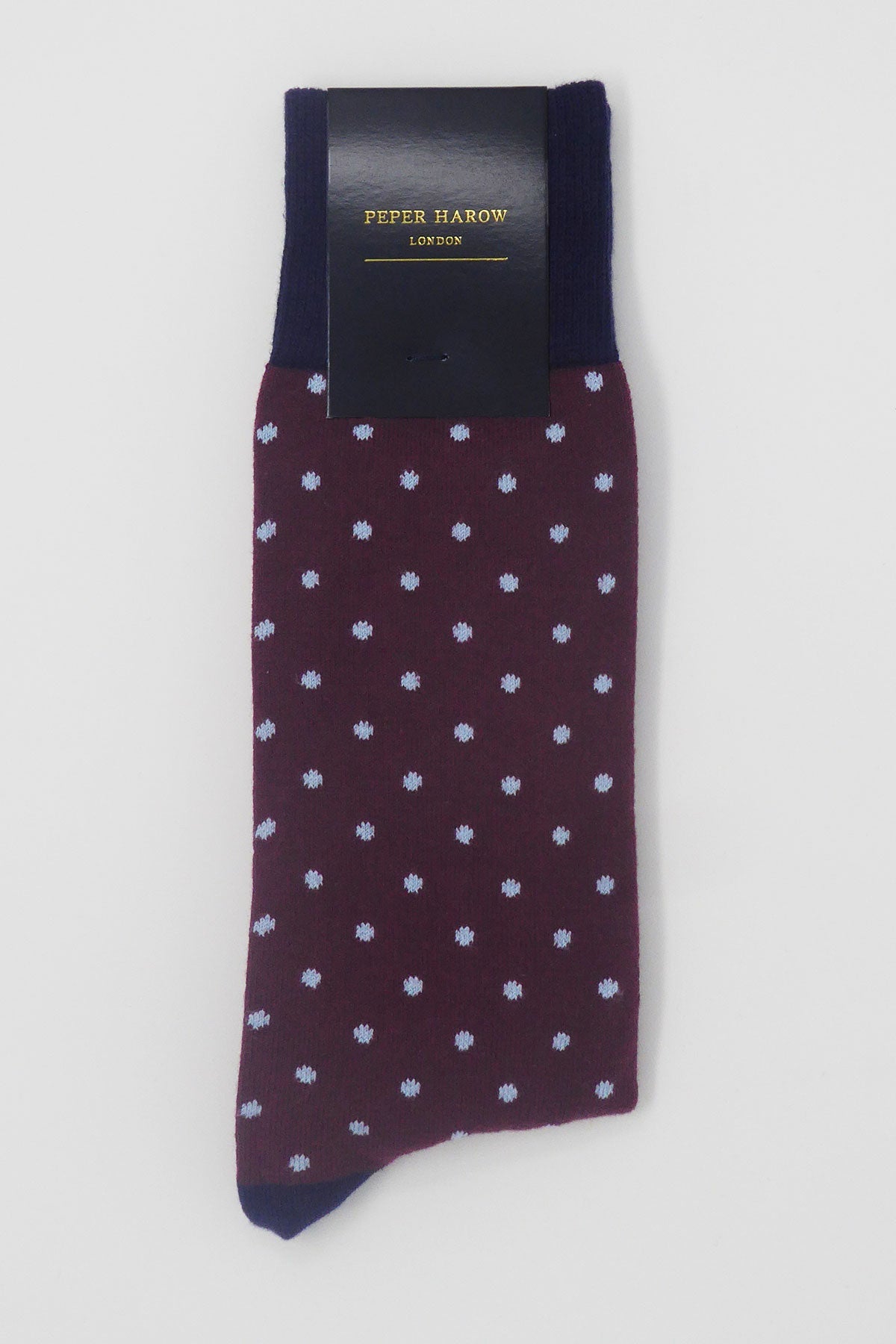 Burgundy Pin Polka men's luxury socks featuring vibrant dots and contrasting cuff, heel, and toe, made from Supima cotton.