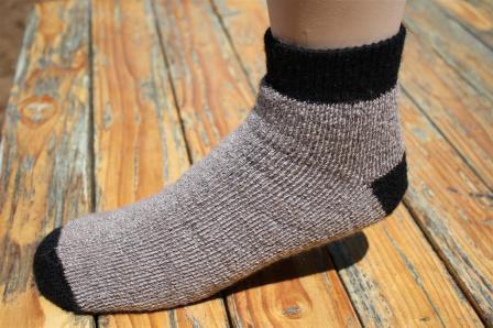 SlipperBootie Alpaca Socks in Cocoa Brown, showcasing their soft texture and cozy design, perfect for warmth and comfort.