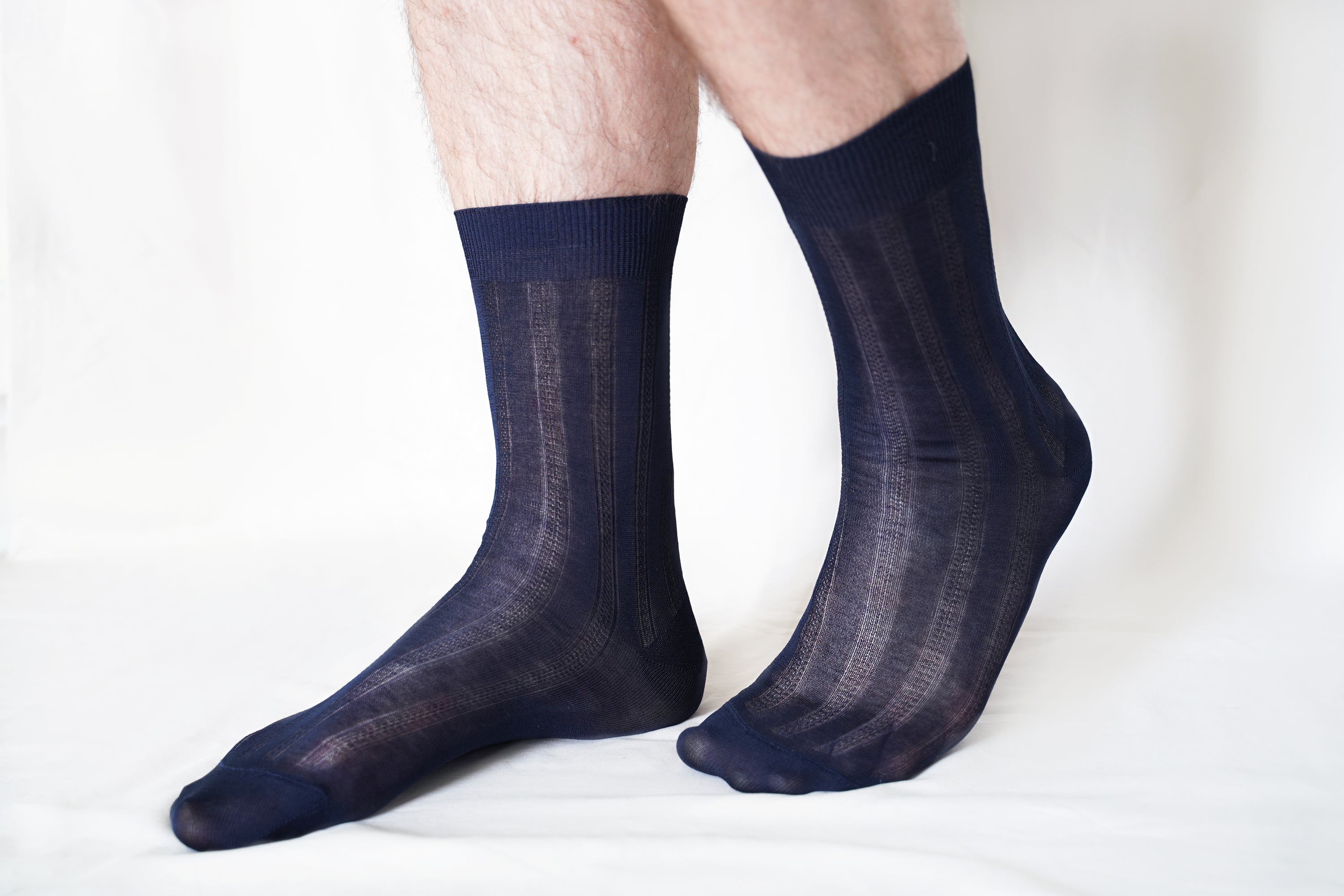 A pair of tittimitti® 100% Mercerized 'Filo di Scozia' Cotton Men's Dress Socks, showcasing their luxurious texture and elegant design, perfect for any occasion.