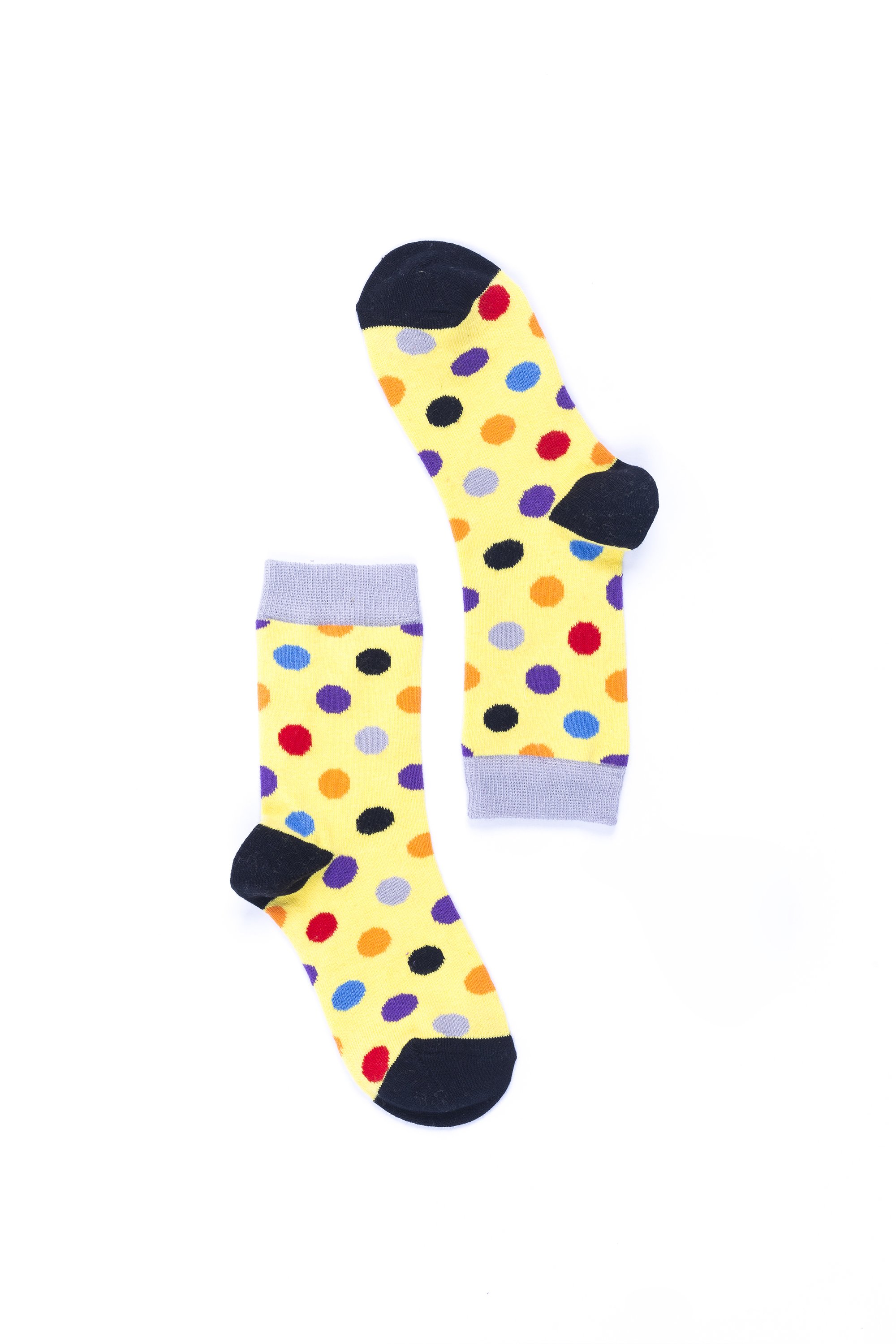 A pair of stylish Women's Blonde Dot Socks featuring a colorful dot pattern, made from premium cotton for comfort and durability.
