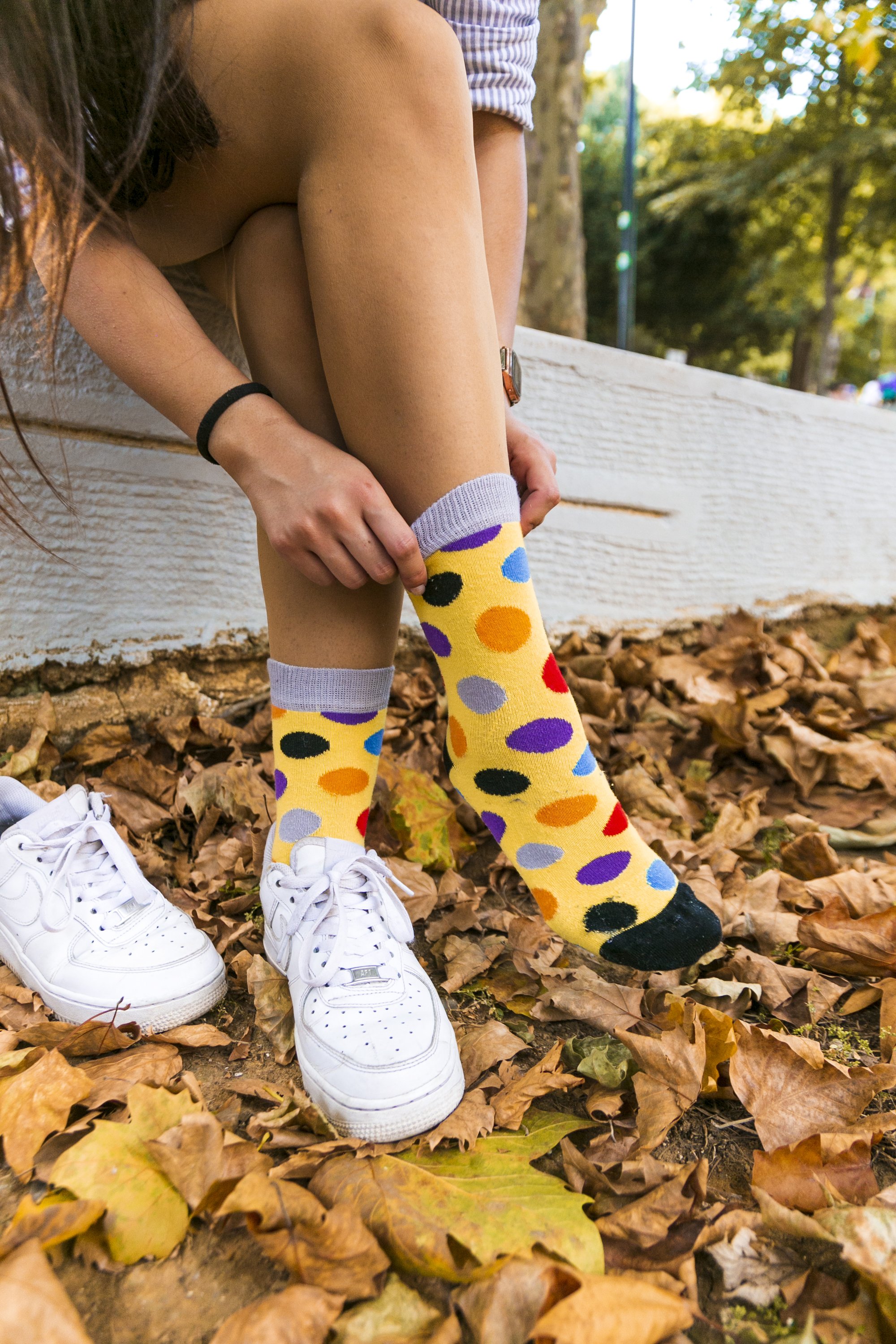 A pair of stylish Women's Blonde Dot Socks featuring a colorful dot pattern, made from premium cotton for comfort and durability.