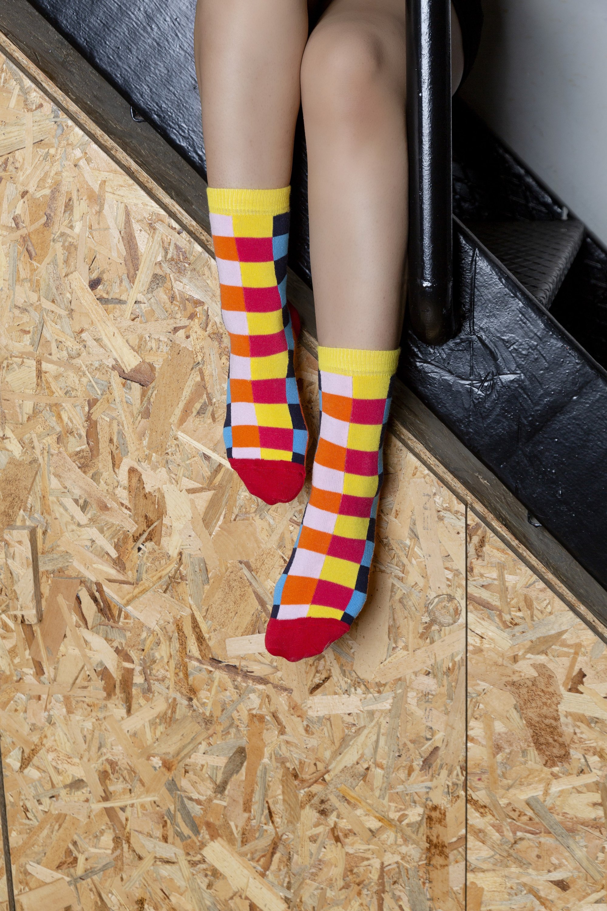 A pair of vibrant Women's Canary Square Socks featuring colorful patterns, designed for comfort and style.