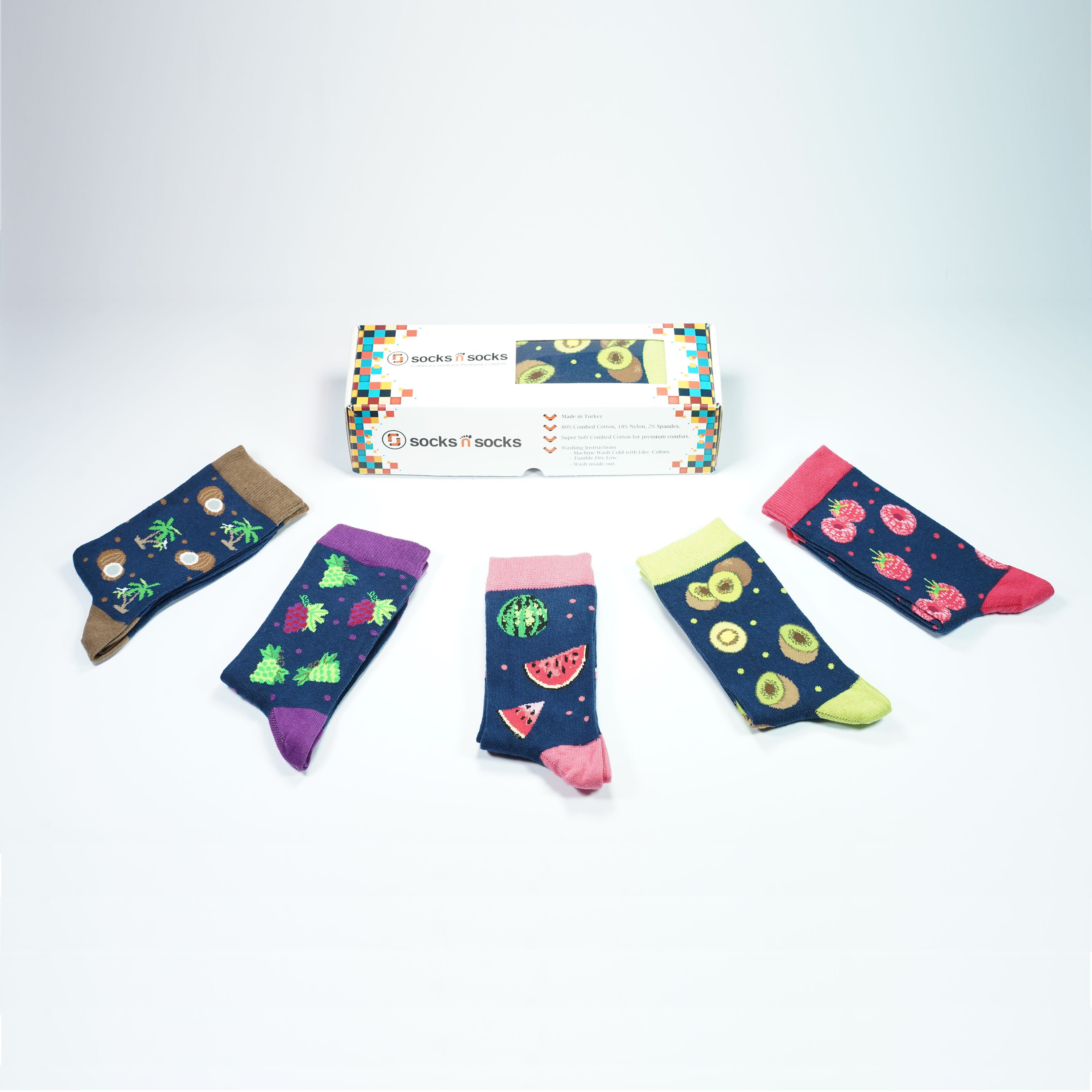 A colorful set of women's socks featuring delightful fruit patterns, made from soft Turkish cotton for comfort and style.