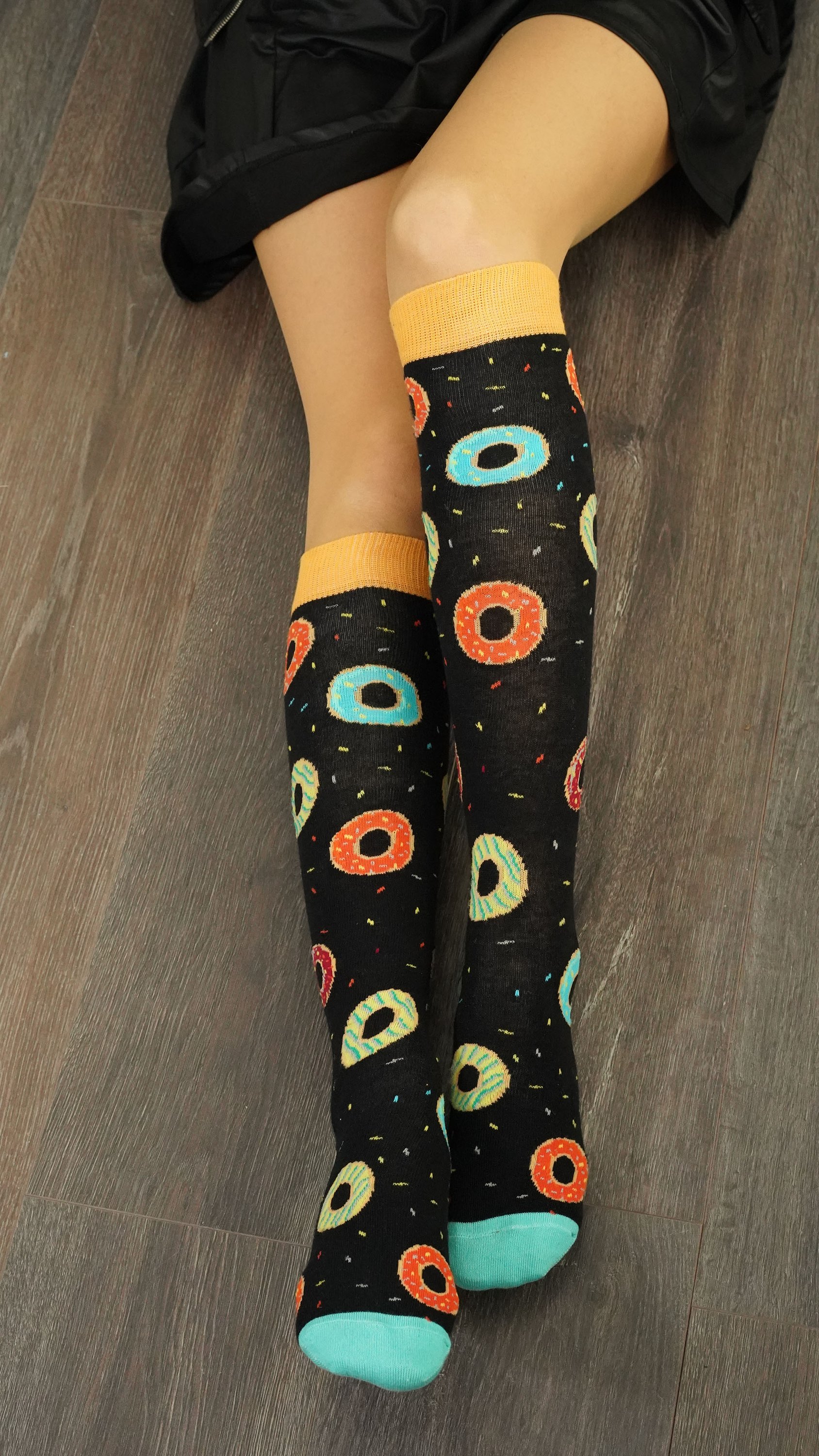 Colorful Women's Donuts Knee High Socks featuring a fun donut pattern, perfect for adding a playful touch to any outfit.