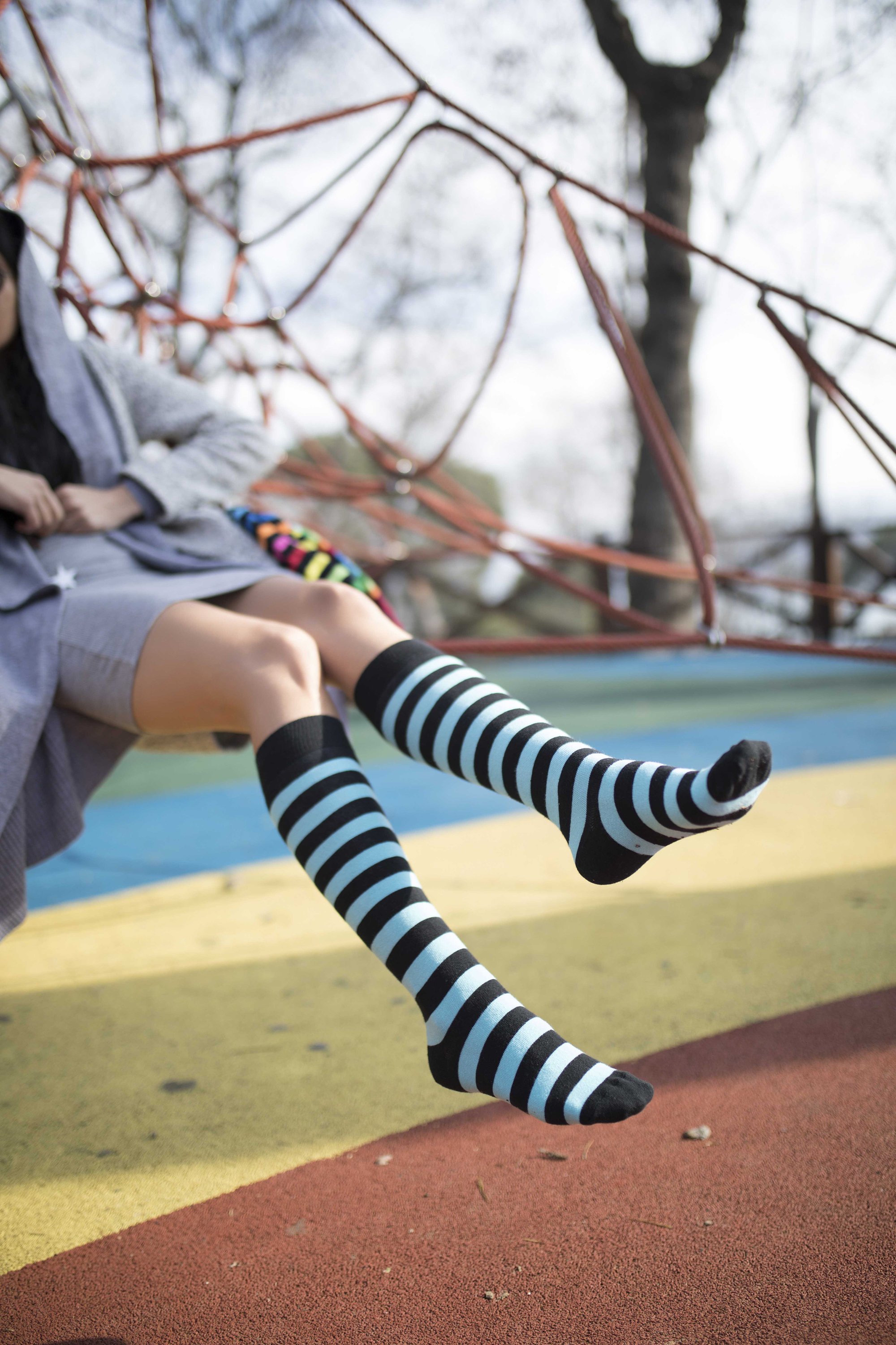 A vibrant set of women's knee-high socks featuring colorful stripes, made from soft Turkish cotton for comfort and style.