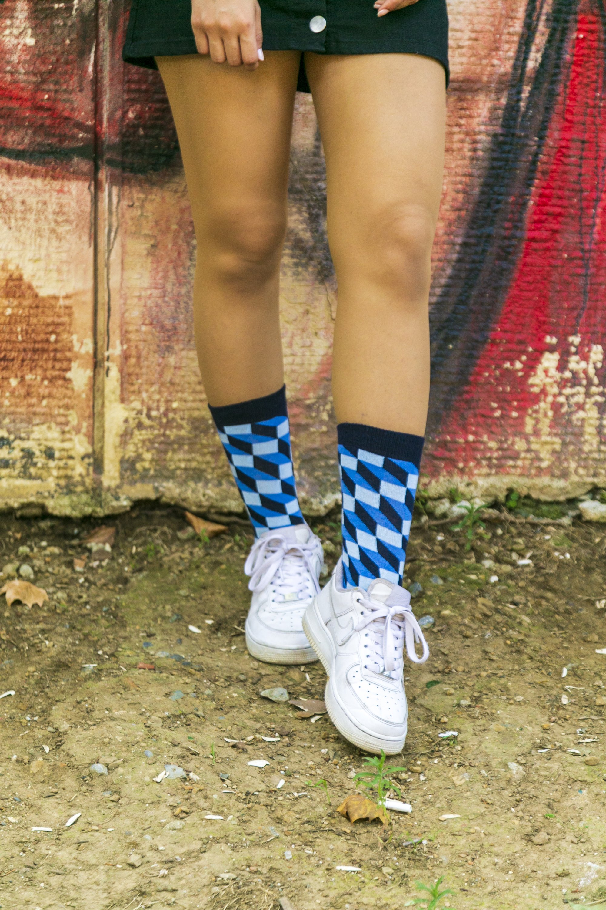 A pair of stylish Women's Navy Block Socks featuring colorful patterns and made from premium cotton for comfort.