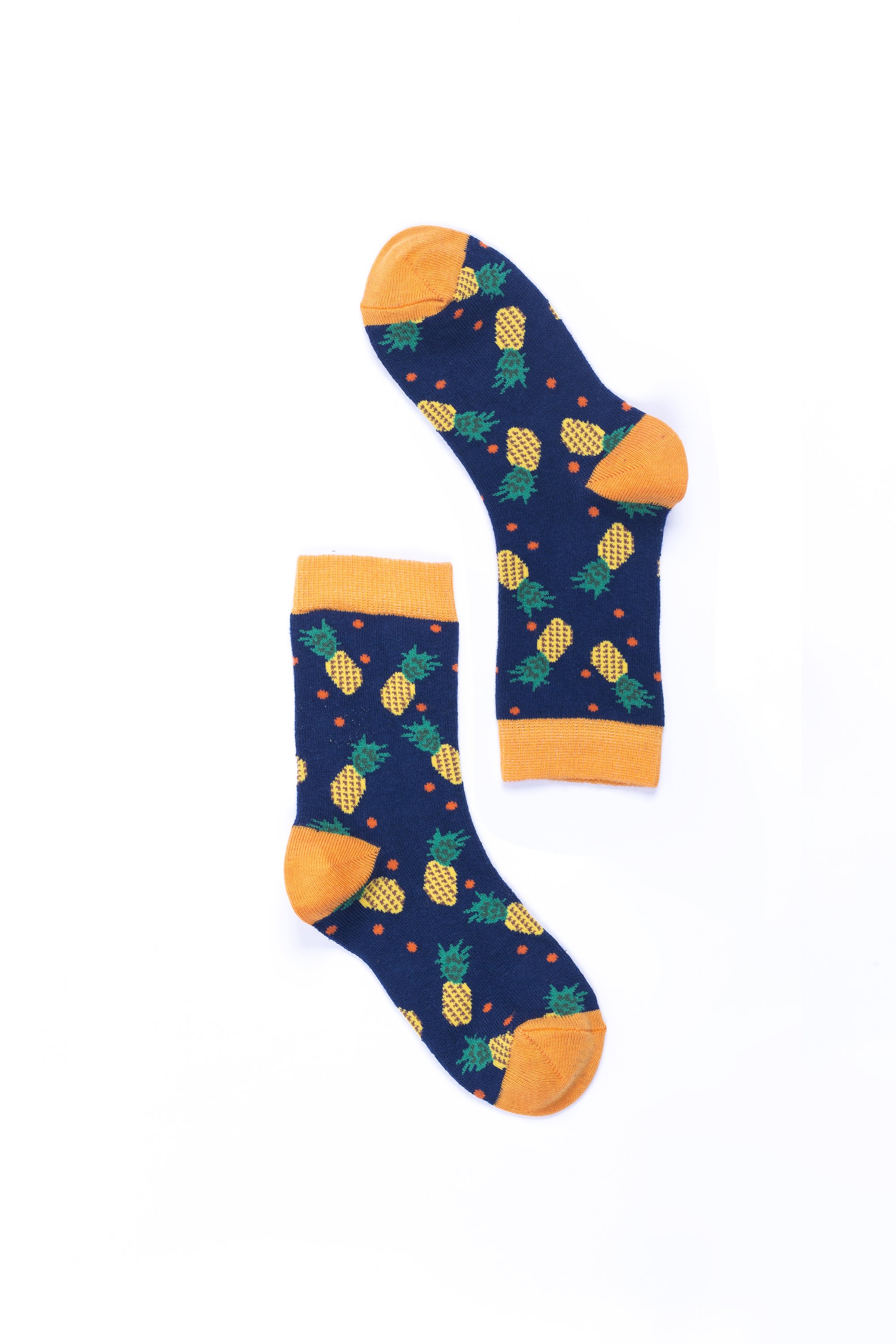 A pair of colorful women's pineapple socks made from soft cotton, featuring a vibrant pineapple pattern.