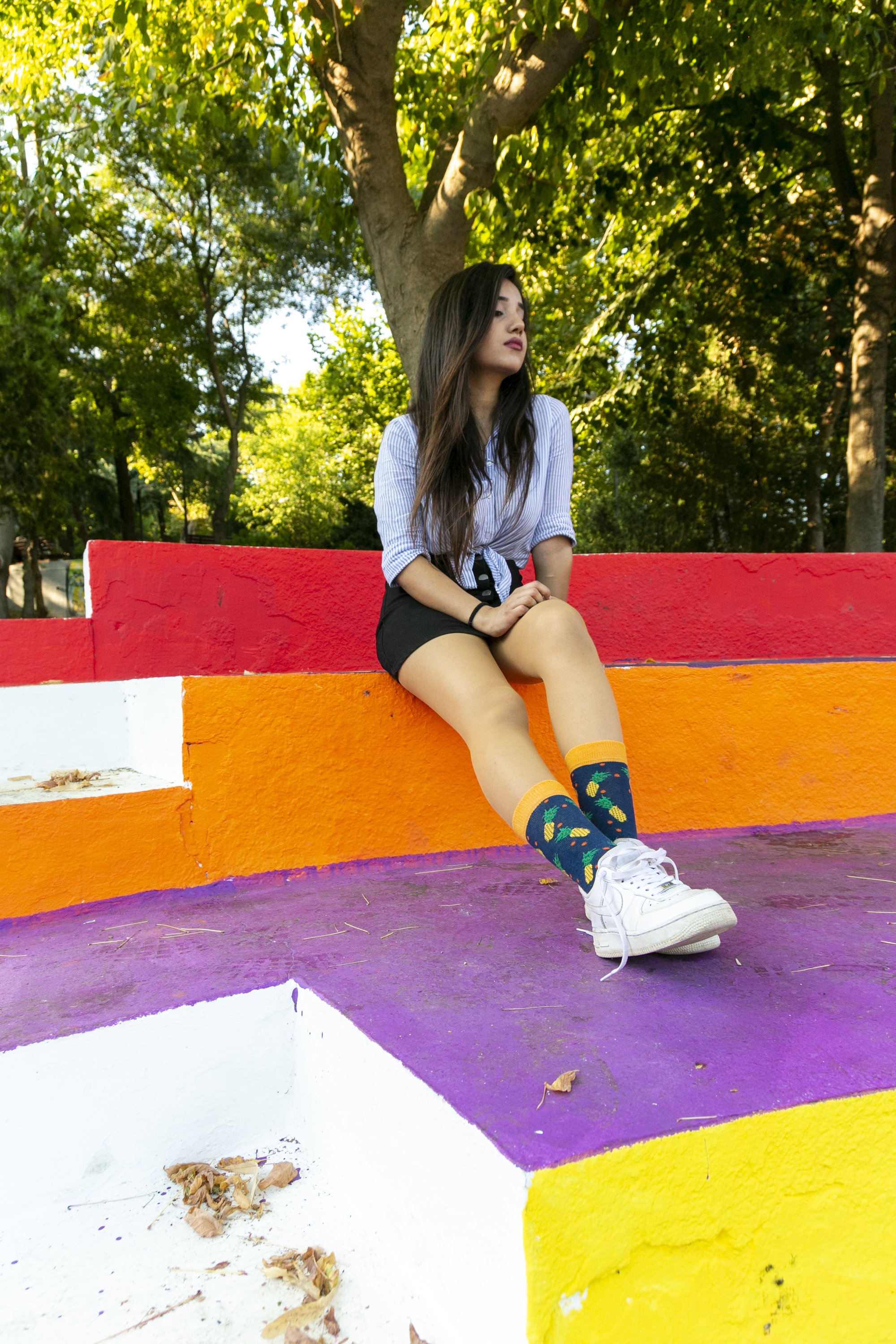 A pair of colorful women's pineapple socks made from soft cotton, featuring a vibrant pineapple pattern.