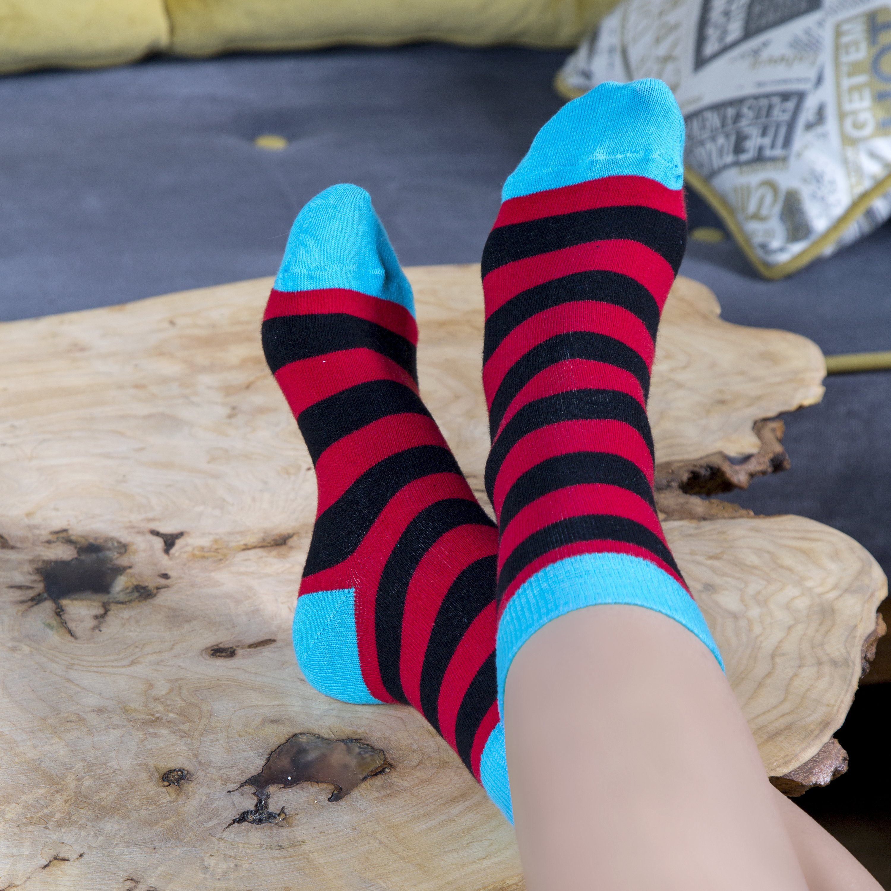 A pair of Women's Red Sky Stripe Socks featuring vibrant red and sky blue stripes, made from soft Turkish cotton for comfort and style.