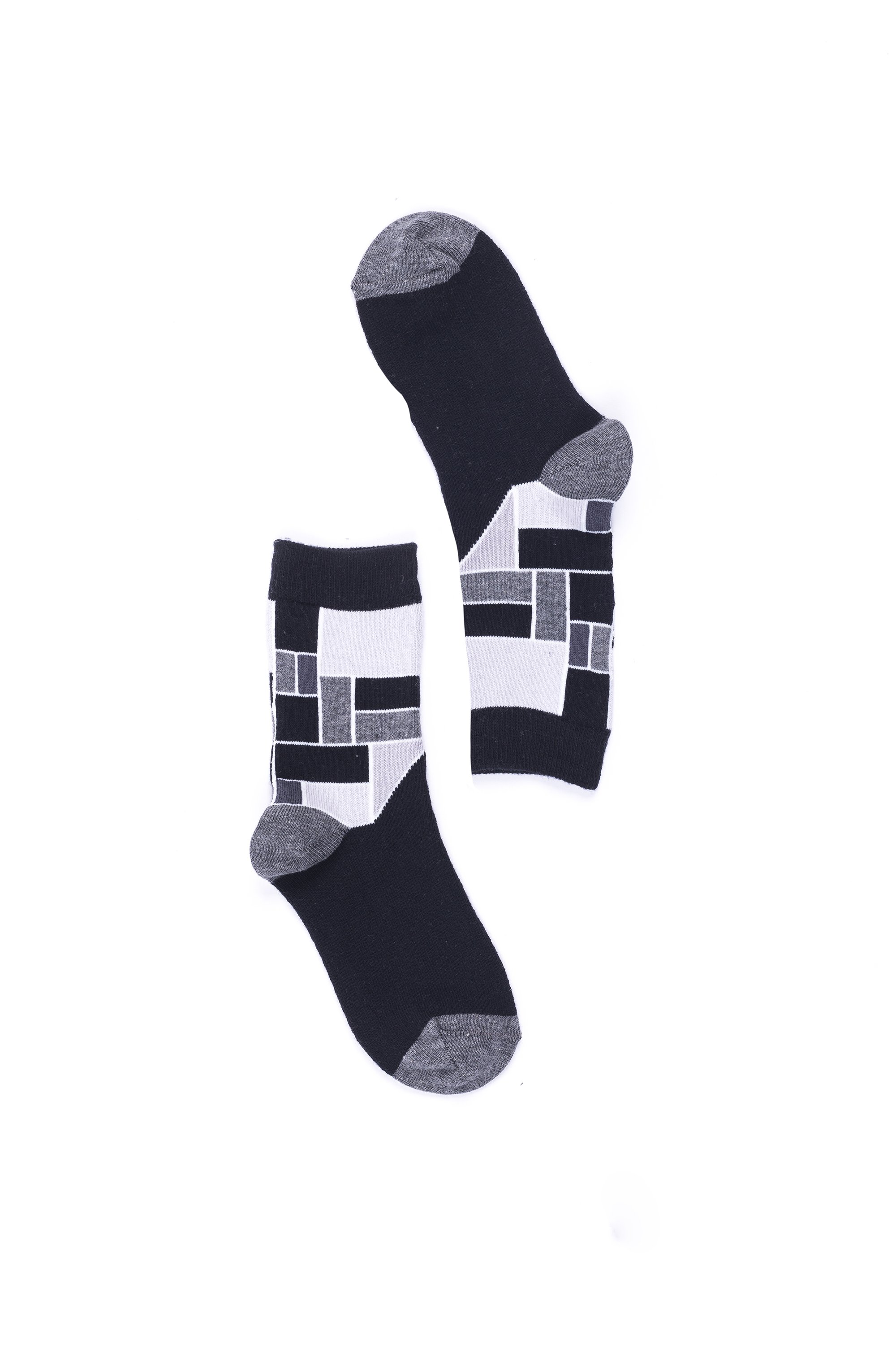 A pair of Women's Stone Cube Socks featuring colorful patterns and a soft texture, perfect for adding style and comfort to any outfit.
