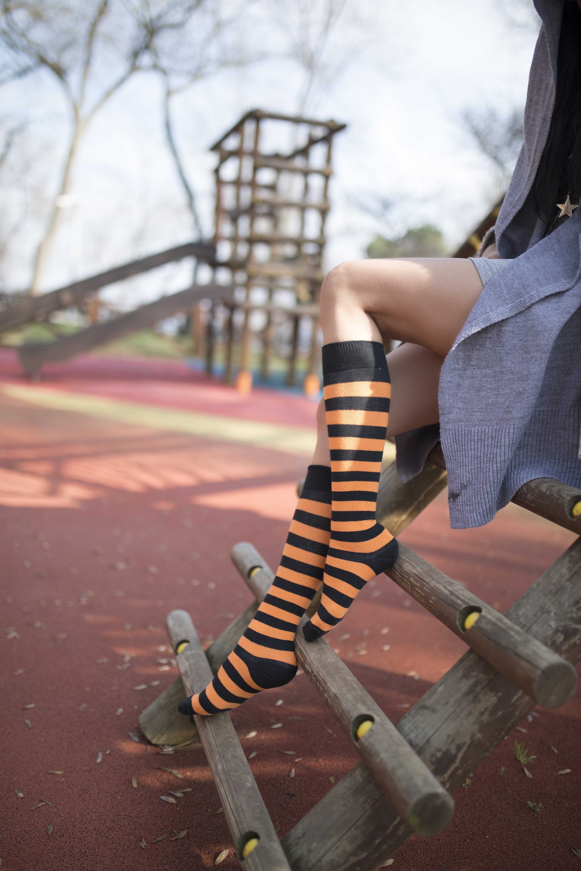 A vibrant set of women's knee-high socks featuring stylish stripes in various colors, perfect for adding flair to any outfit.