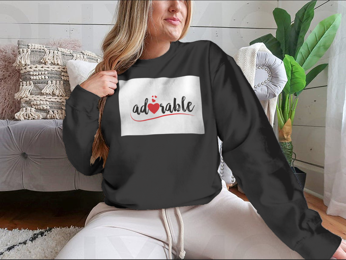 Adorable sweatshirt featuring a red love heart design, showcasing a stylish and comfortable fit.