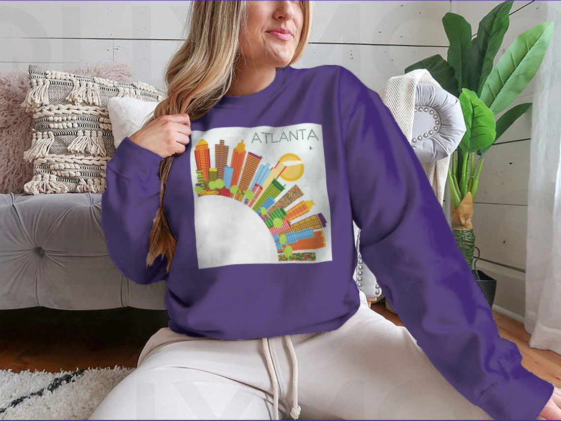 Vibrant artwork of the Atlanta skyline featuring colorful buildings against a clear blue sky, ideal for home or office decor.