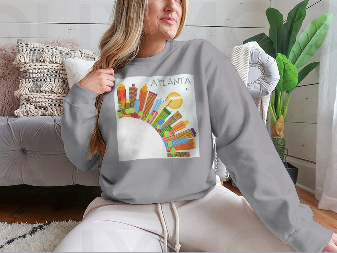 Vibrant artwork of the Atlanta skyline featuring colorful buildings against a clear blue sky, ideal for home or office decor.