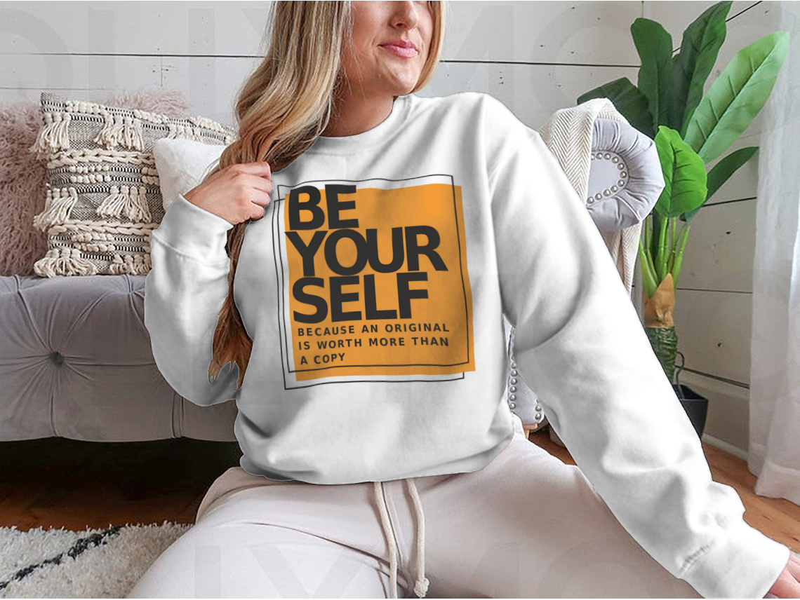 A stylish cotton shirt featuring the phrase 'Be Yourself Because An Original Is Worth More Than A Copy' in a bold design, perfect for casual wear.