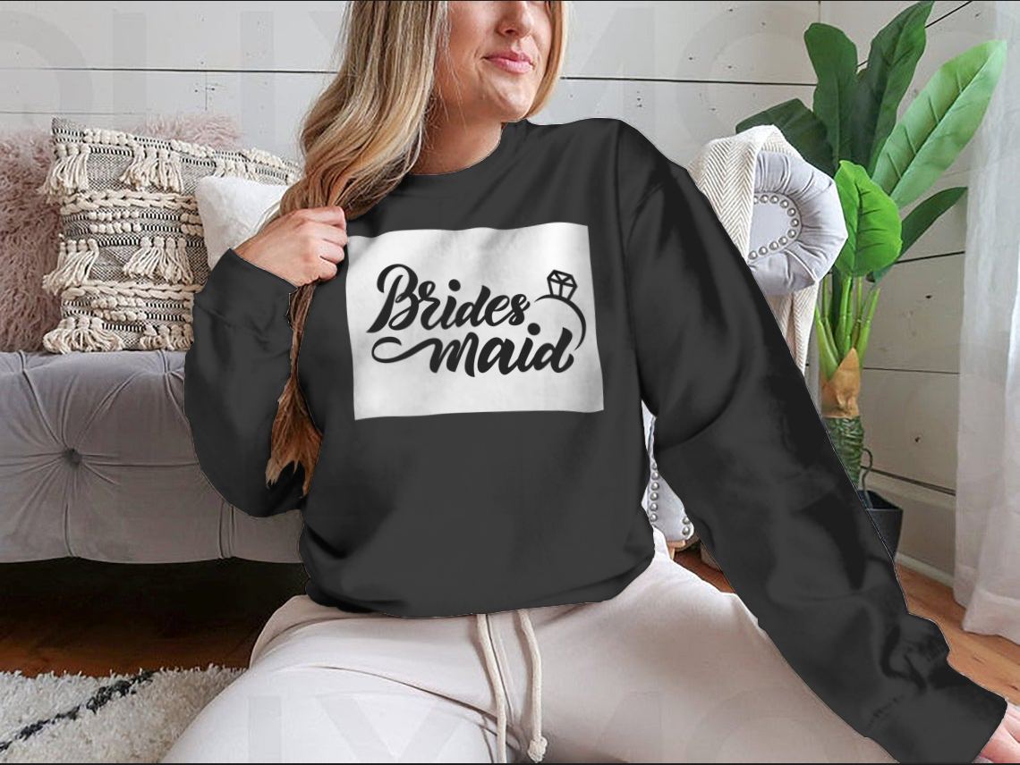 Bridesmaid sweatshirt featuring hand lettering design with wedding ring motif, perfect for bridal parties.